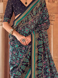 Alluring Navy Blue Patola Printed Georgette Event Wear Saree