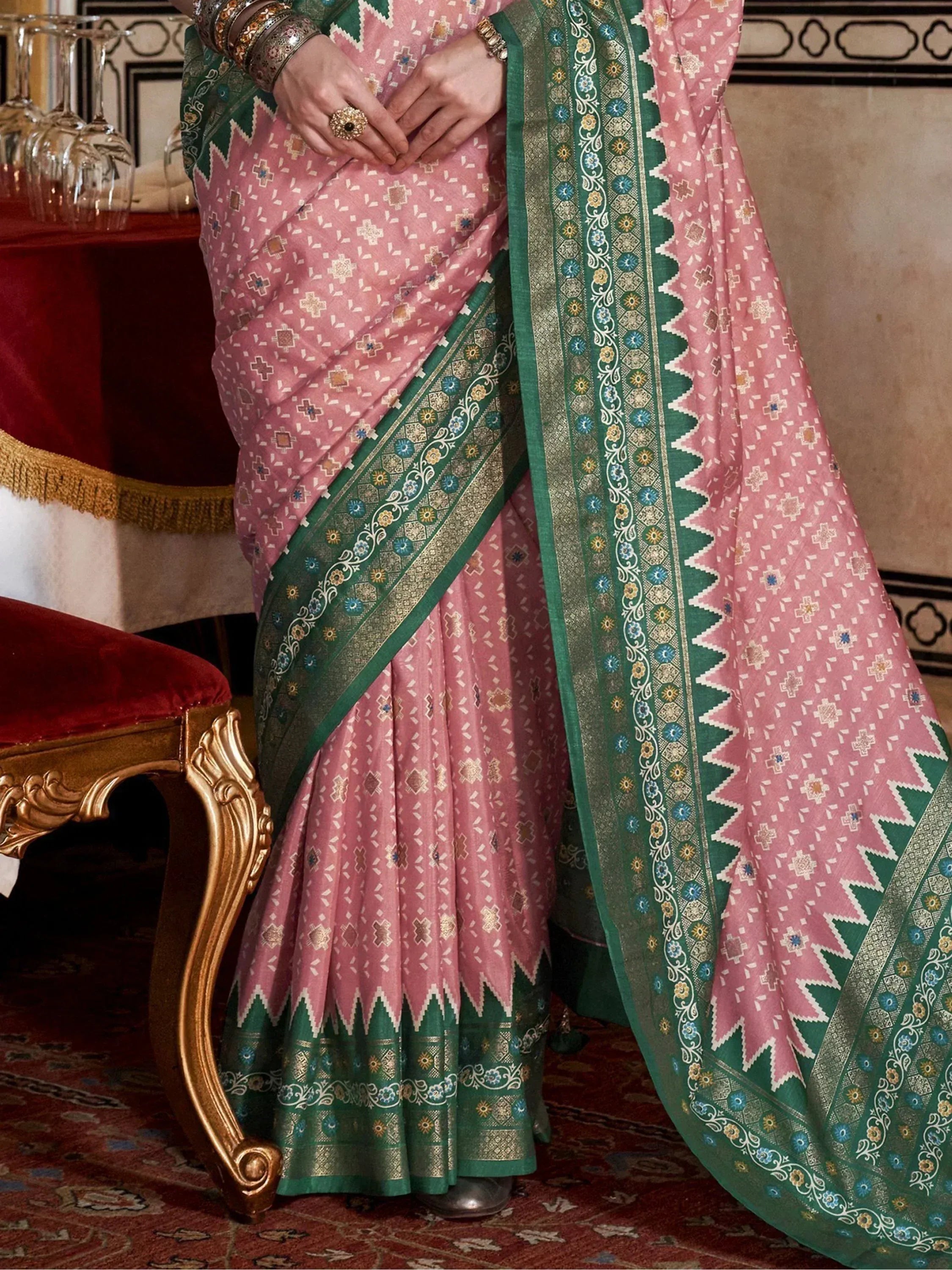 Pink and green designer saree with intricate floral border, ethnic wear for women