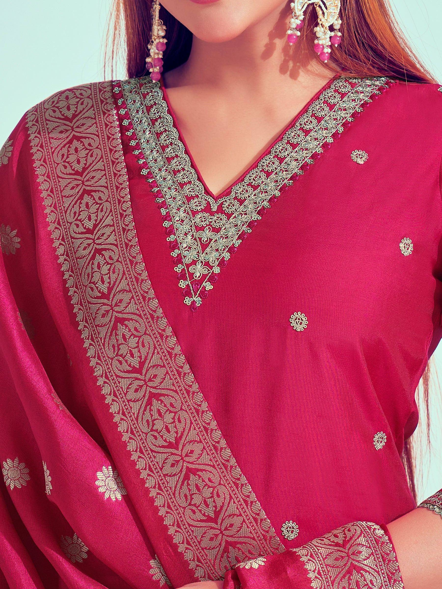 Pink ethnic salwar kameez with gold embroidery and matching jewelry