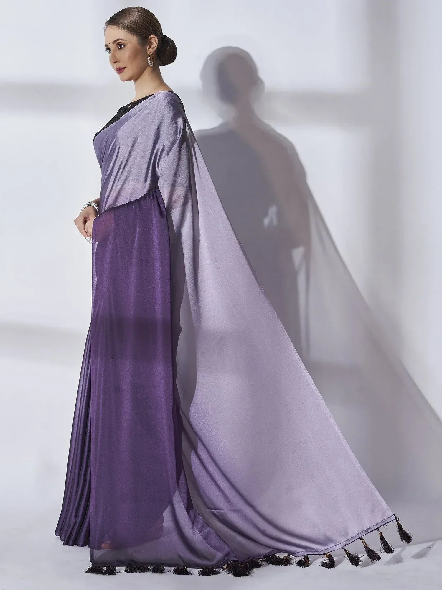 Purple satin saree with black tassels, elegant Indian ethnic wear for women