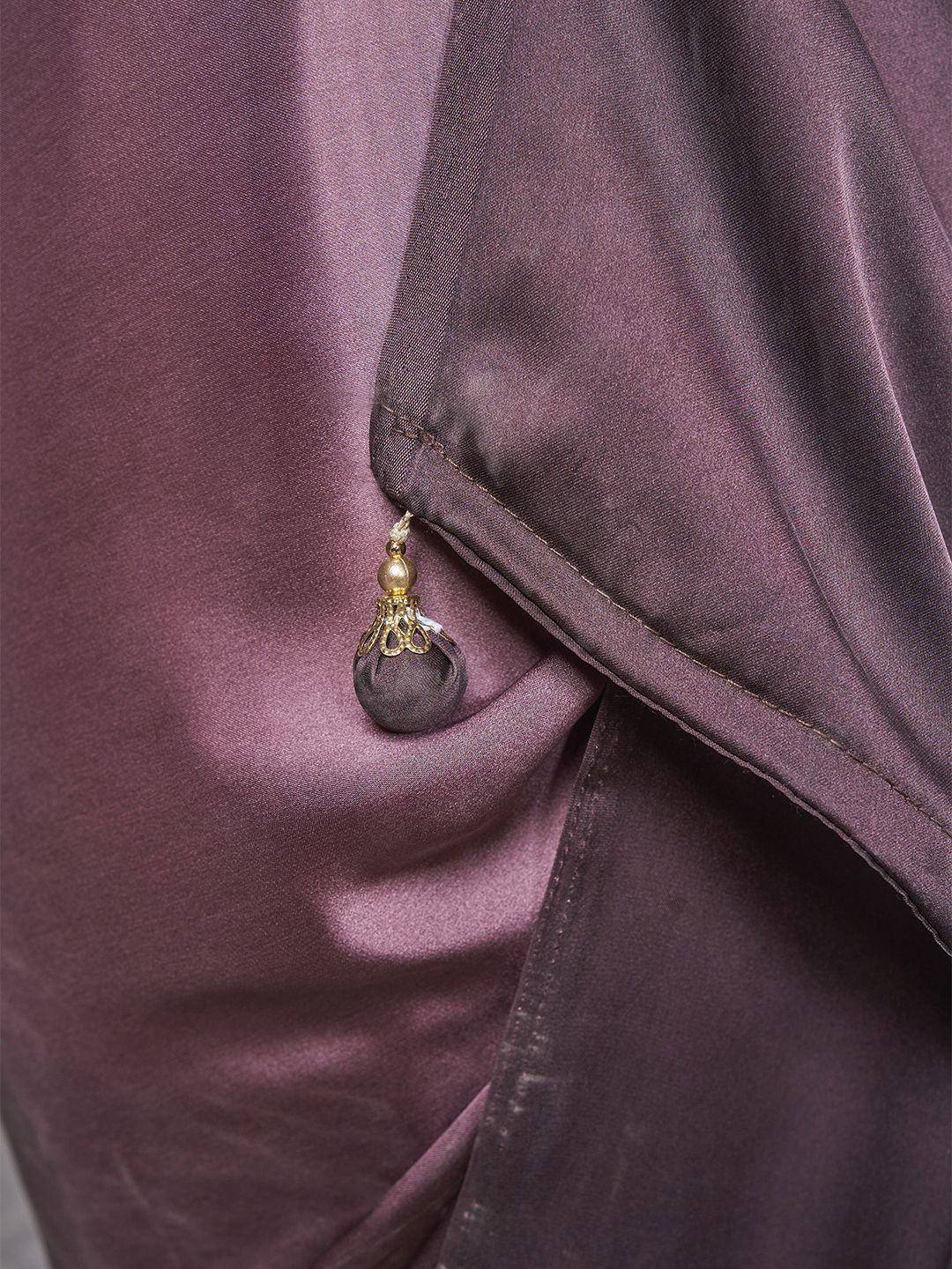 Purple satin ethnic gown with gold tassel detail, designer Indian wear