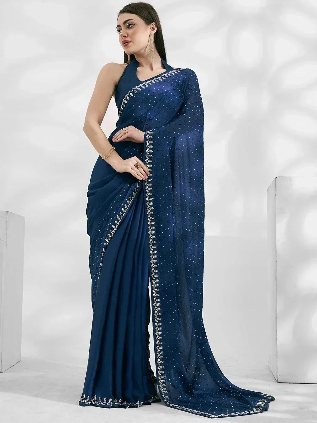 Navy blue designer saree with gold embroidery and polka dots, elegant ethnic wear for women