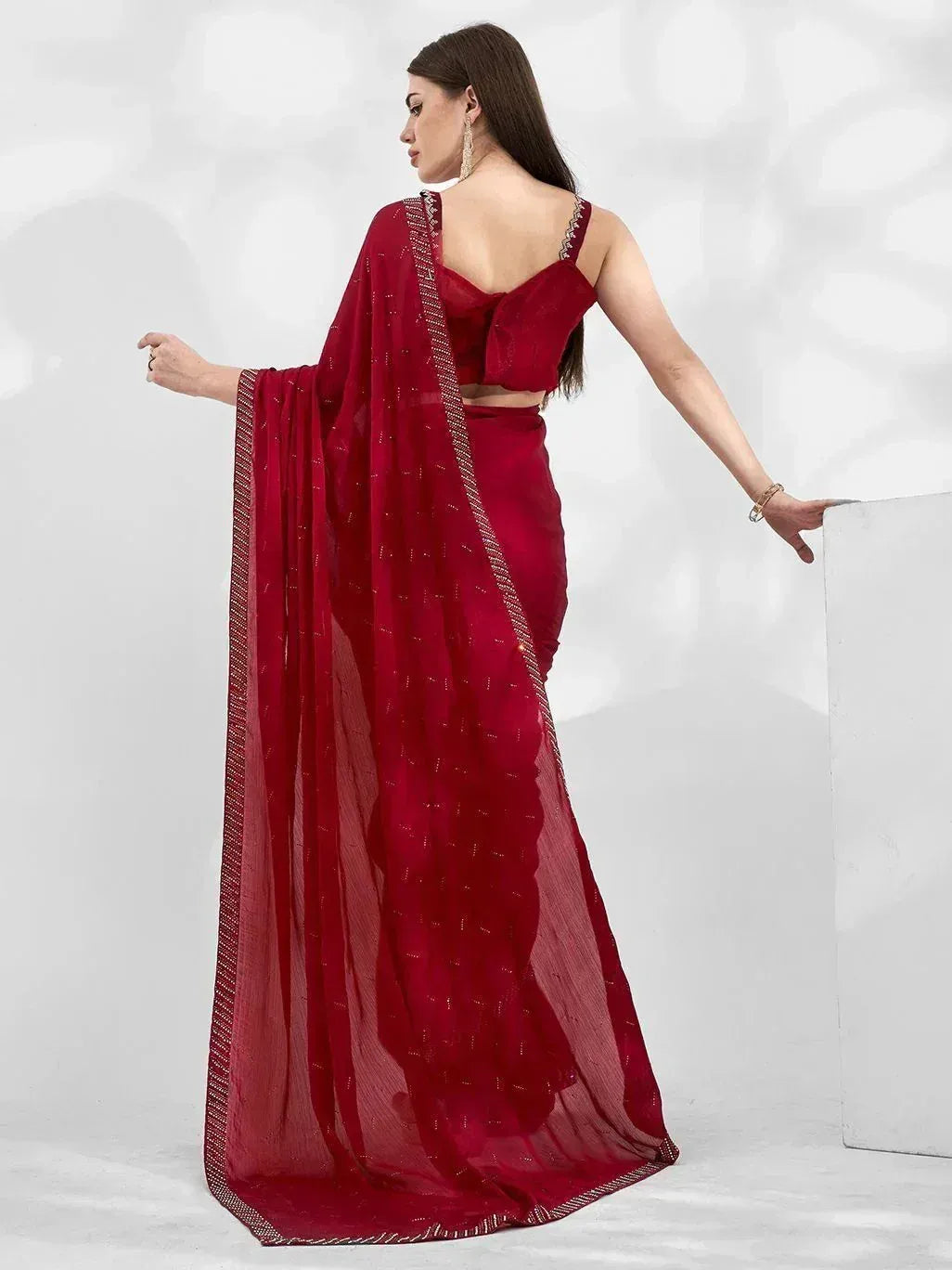 Maroon saree with gold embroidery and backless blouse, elegant ethnic wear for women