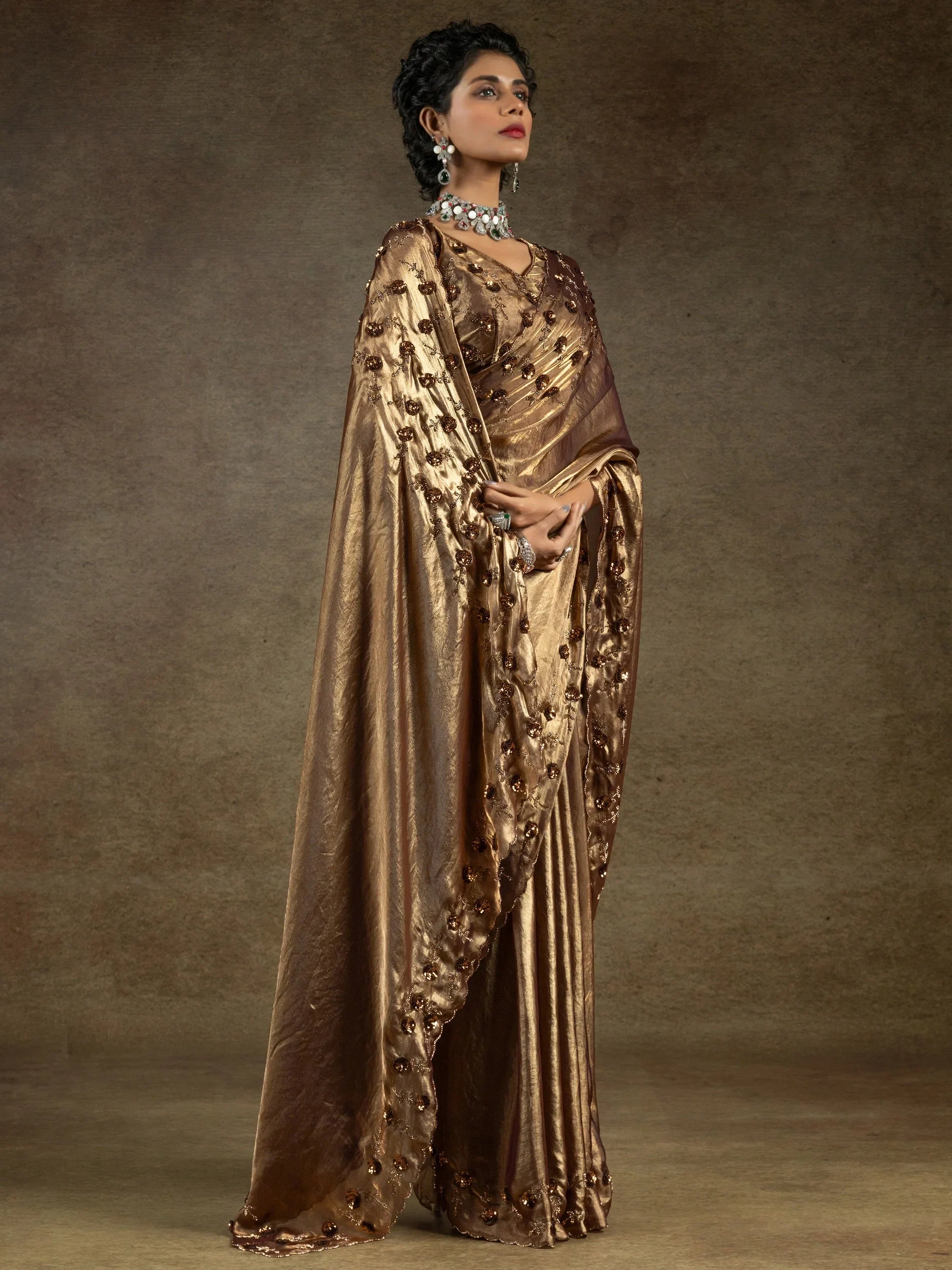 Mesmerizing Golden Satin Party Wear Saree With Jarkan Work Blouse