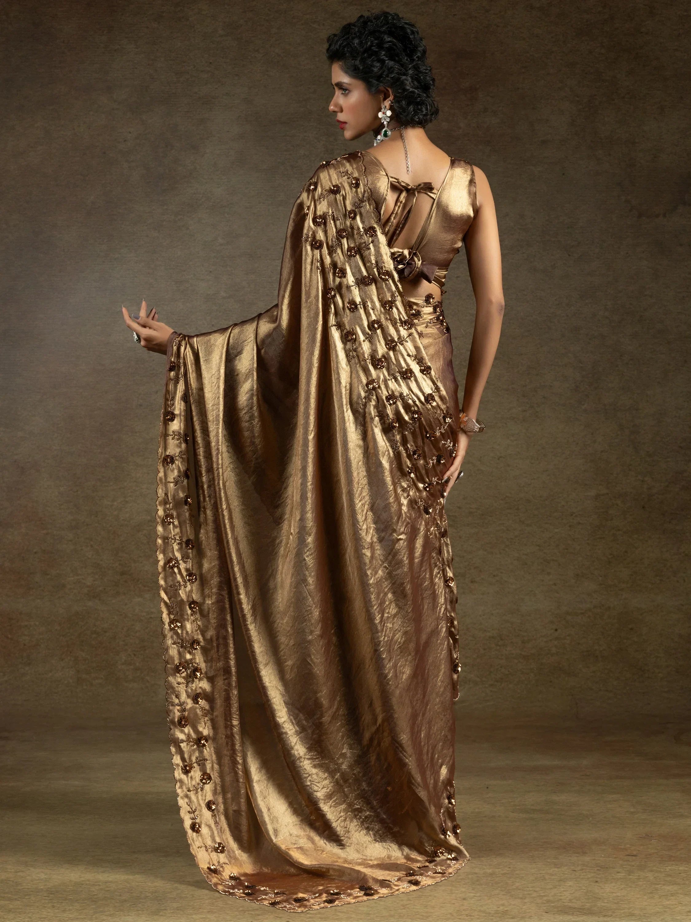 Mesmerizing Golden Satin Party Wear Saree With Jarkan Work Blouse