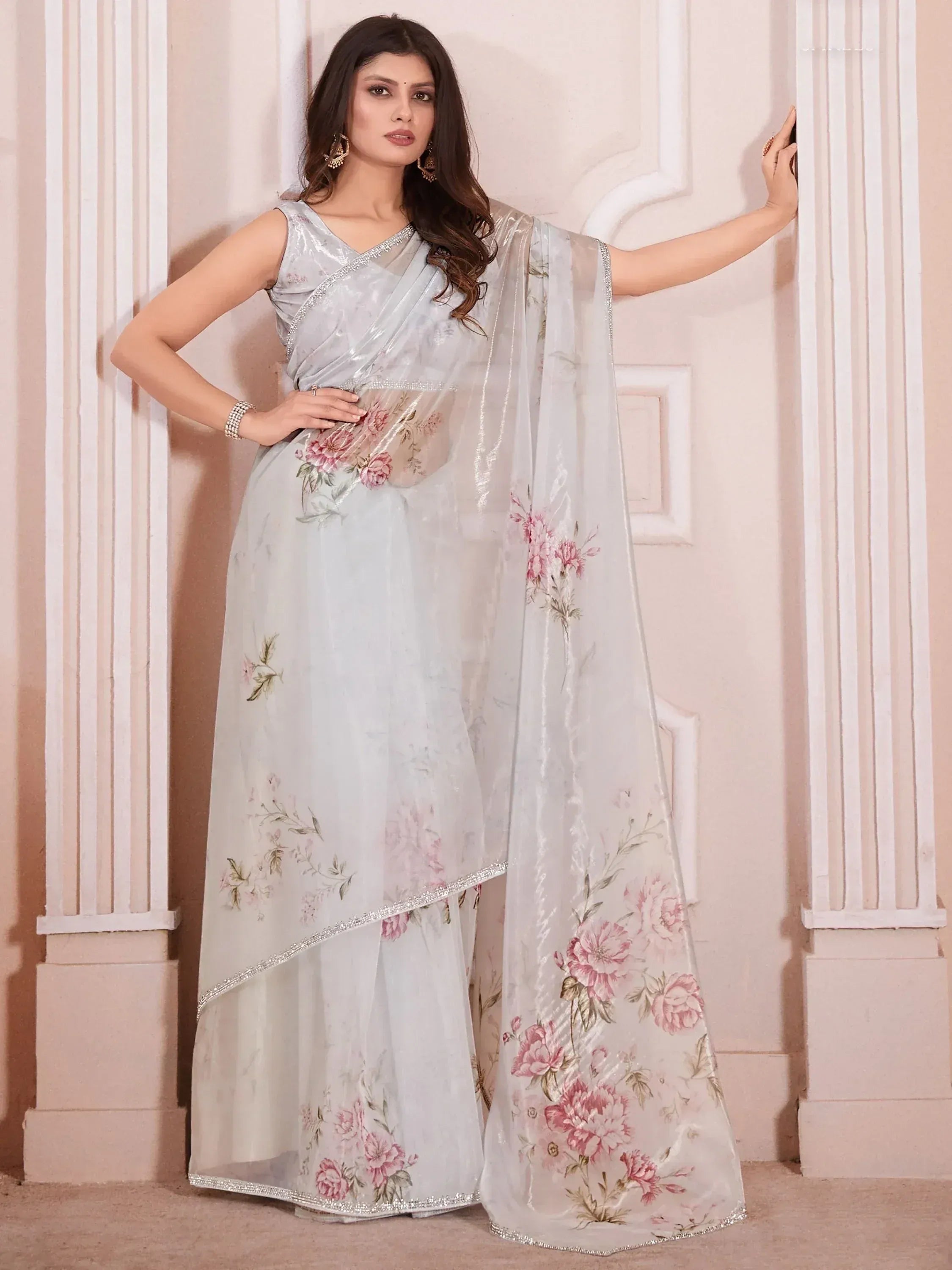 Light blue floral printed saree with silver border, perfect for Indian ethnic occasions