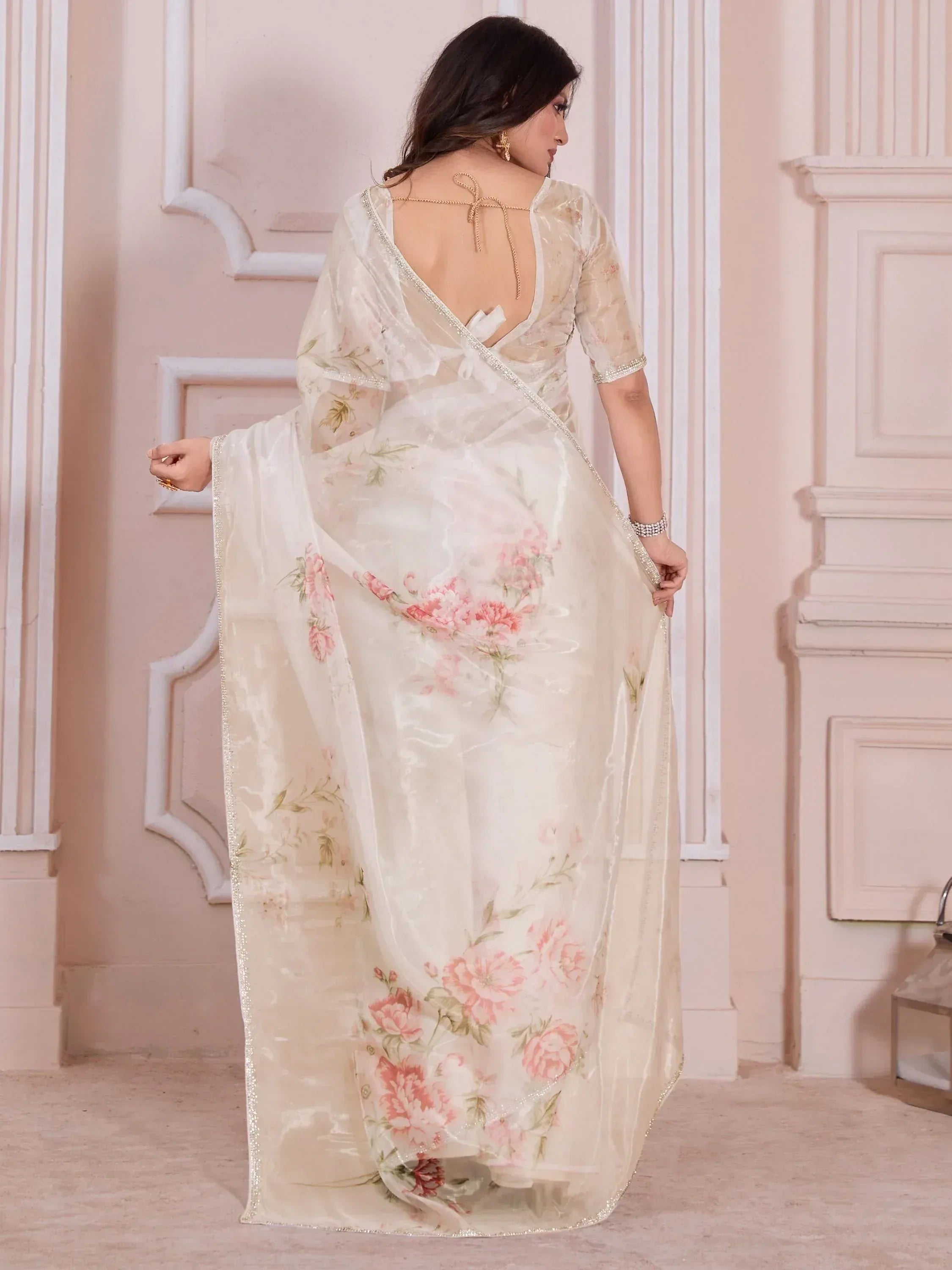 Elegant floral saree with backless blouse, perfect for Indian ethnic occasions