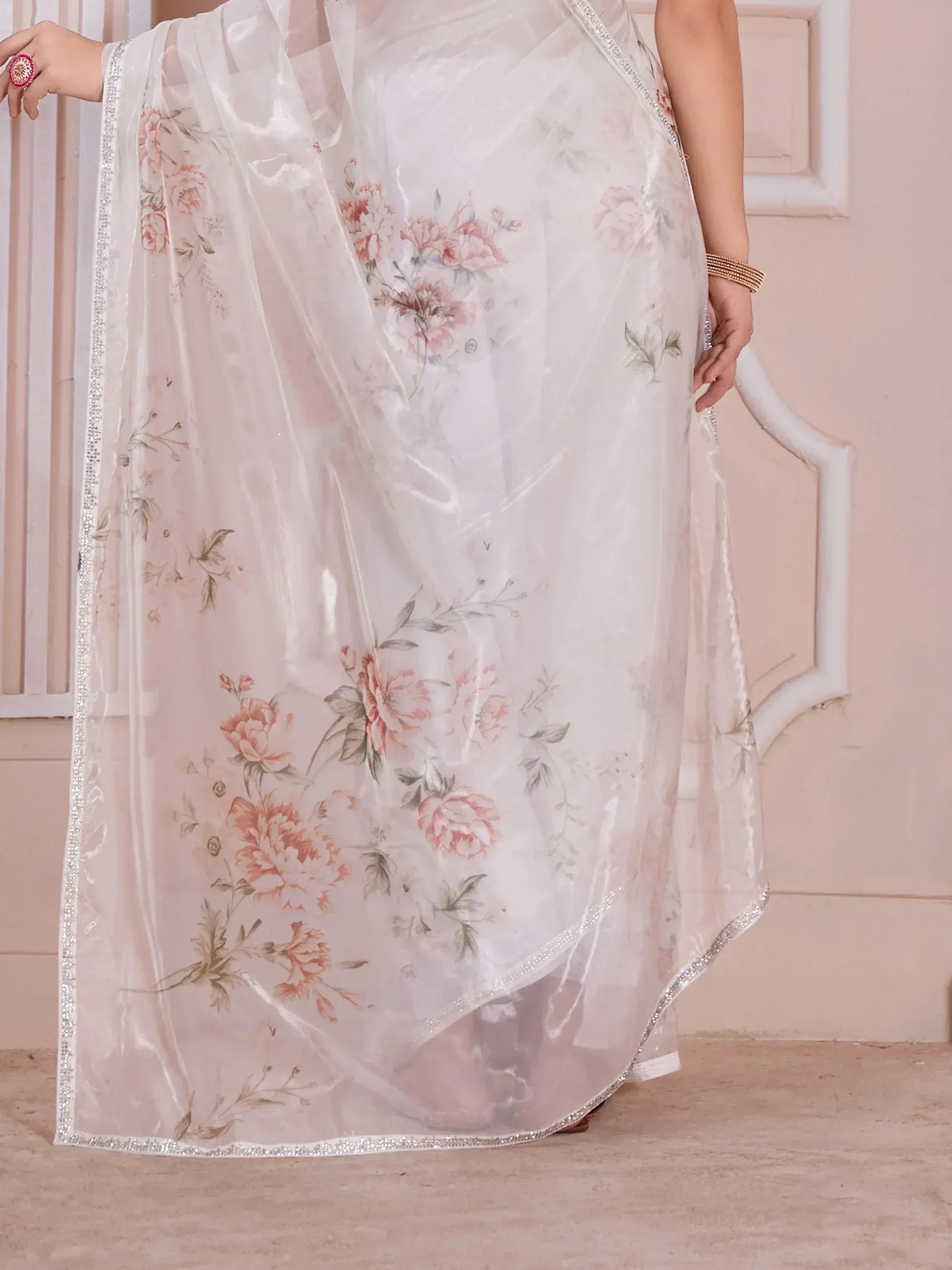 White floral saree with pink roses and silver border, elegant Indian ethnic wear