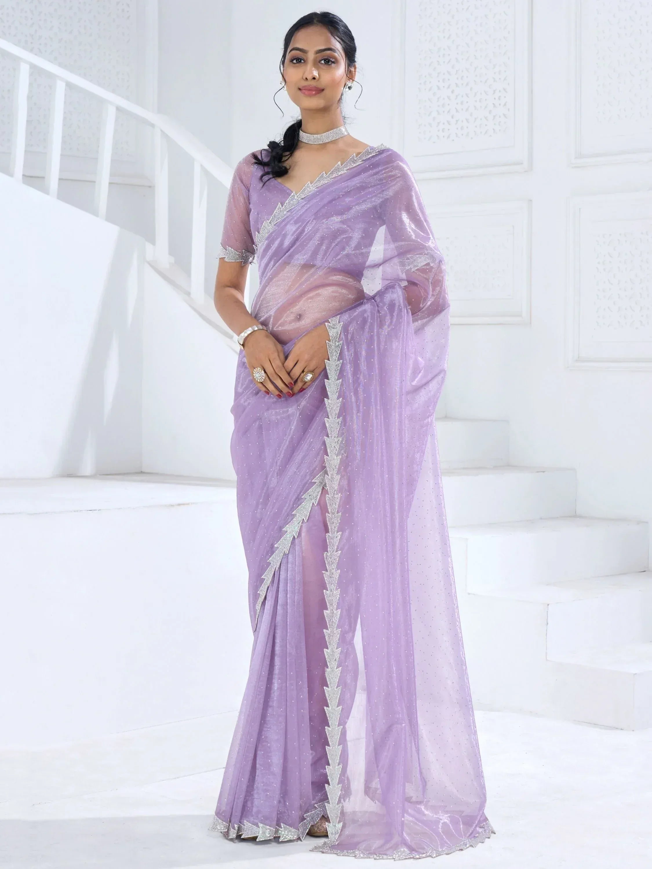 Lavender ethnic saree with silver zari border, perfect for Indian weddings and festive occasions
