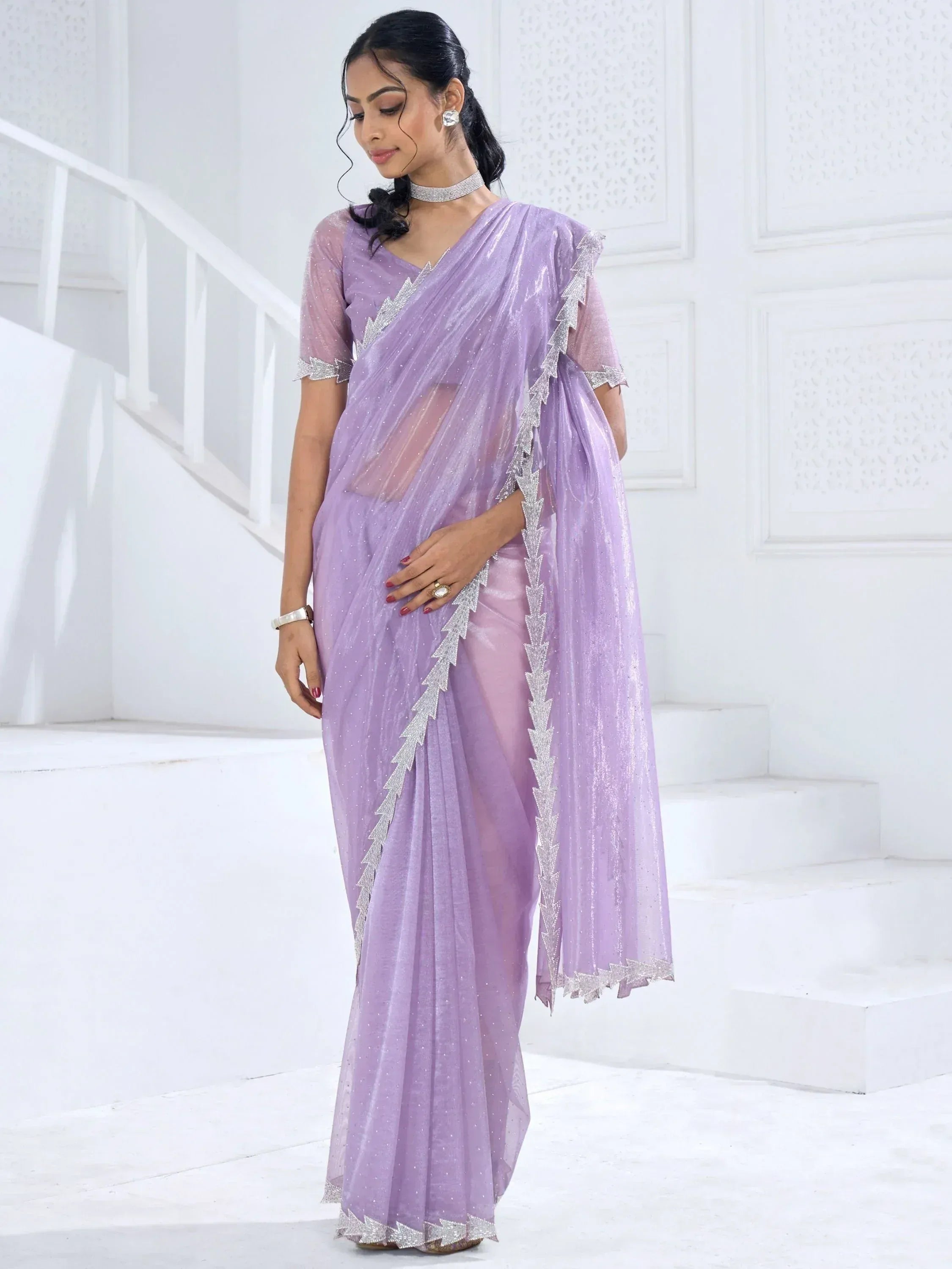 Lavender ethnic saree with silver embroidery, perfect for Indian weddings or festive occasions