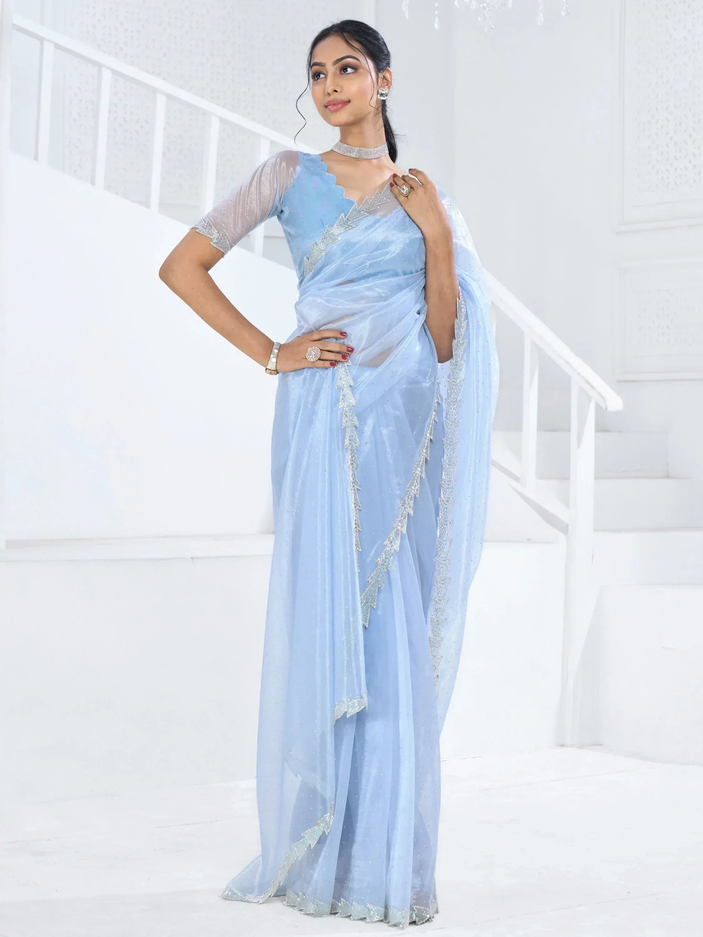 Light blue designer saree with silver embroidery, perfect for Indian ethnic wear occasions