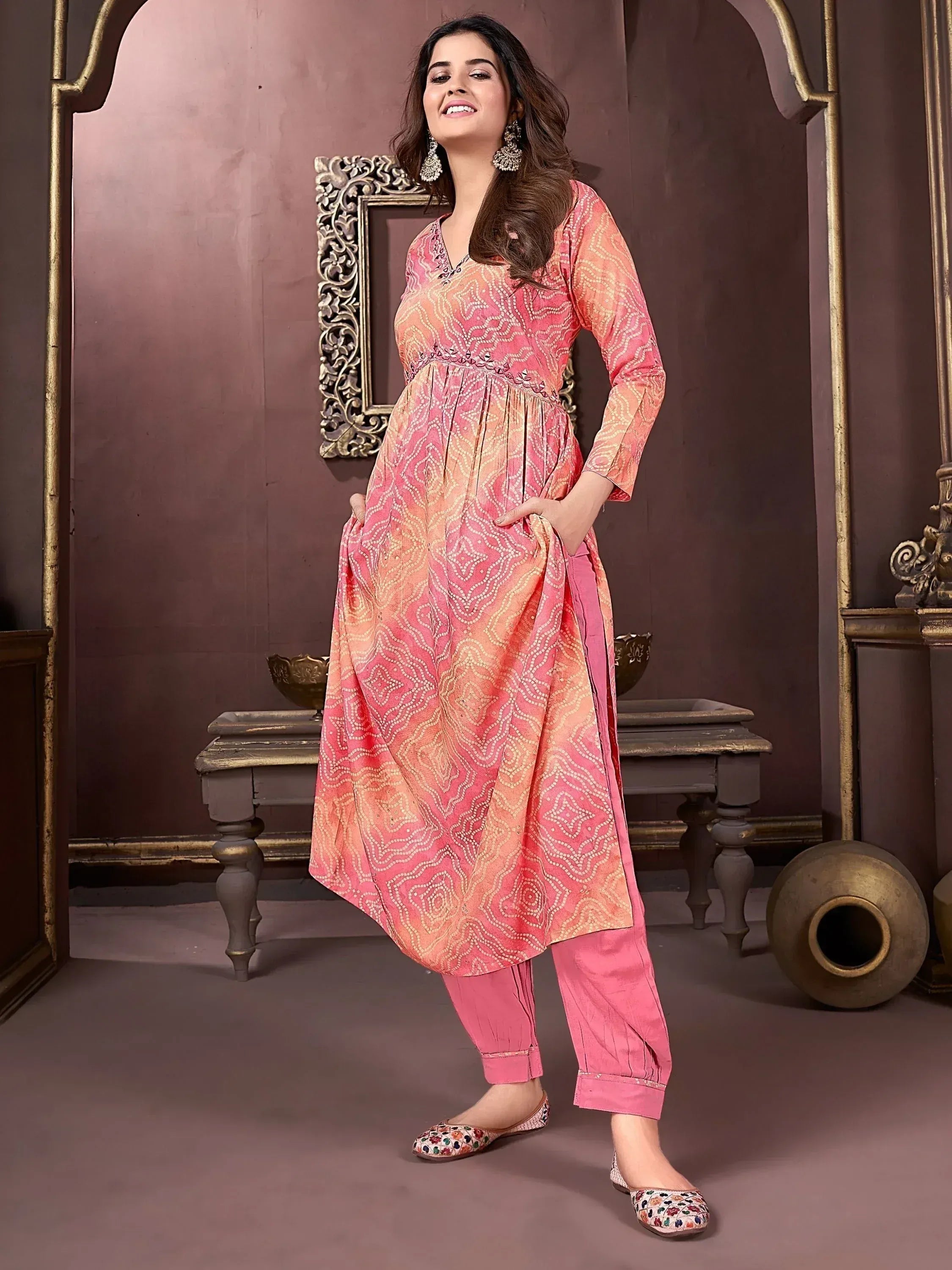 Pink printed ethnic kurta with matching pants, perfect for Indian wear and festive occasions.