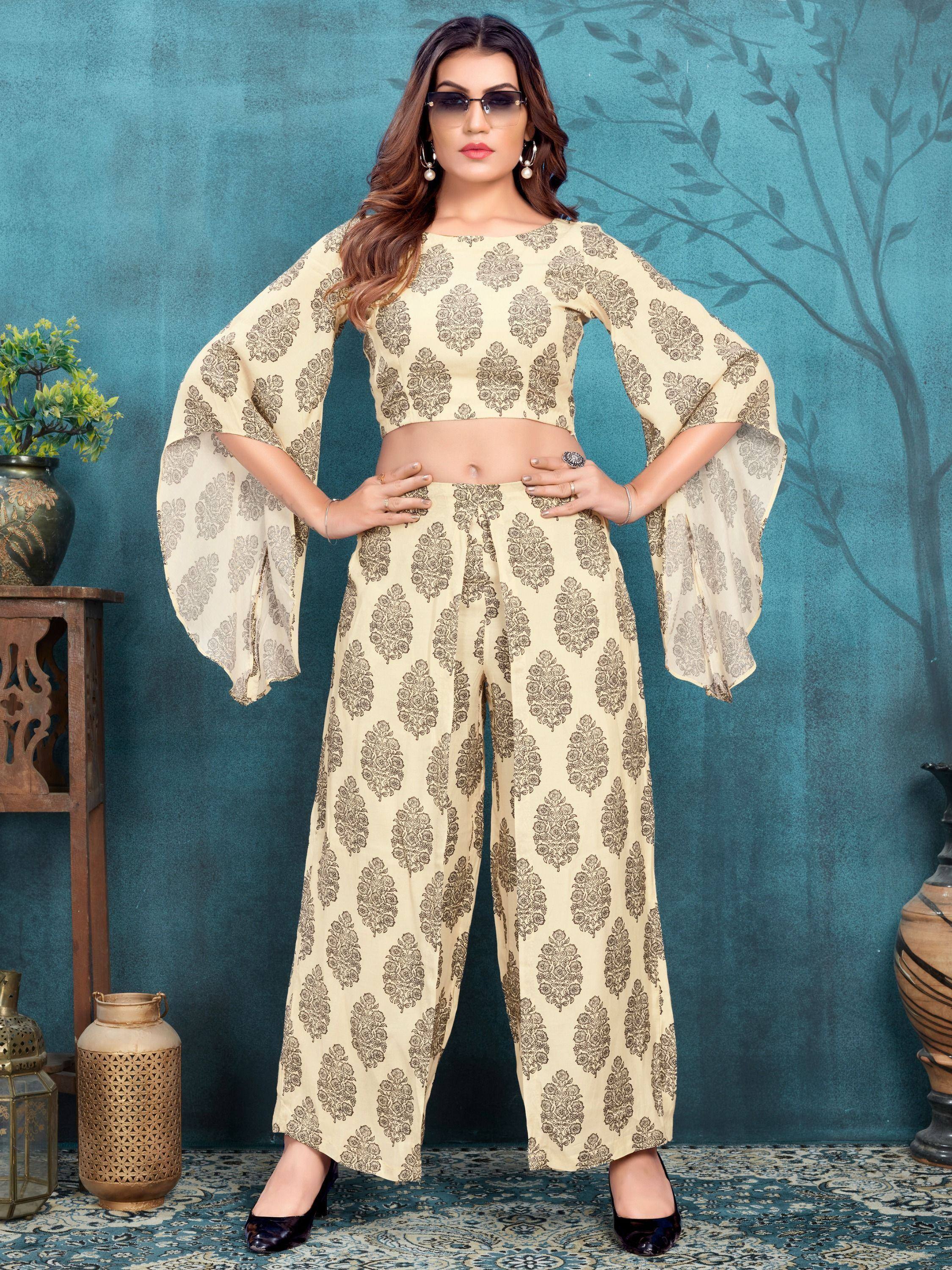 Cream floral print ethnic palazzo set with bell sleeves, perfect for Indian occasions and festive wear.