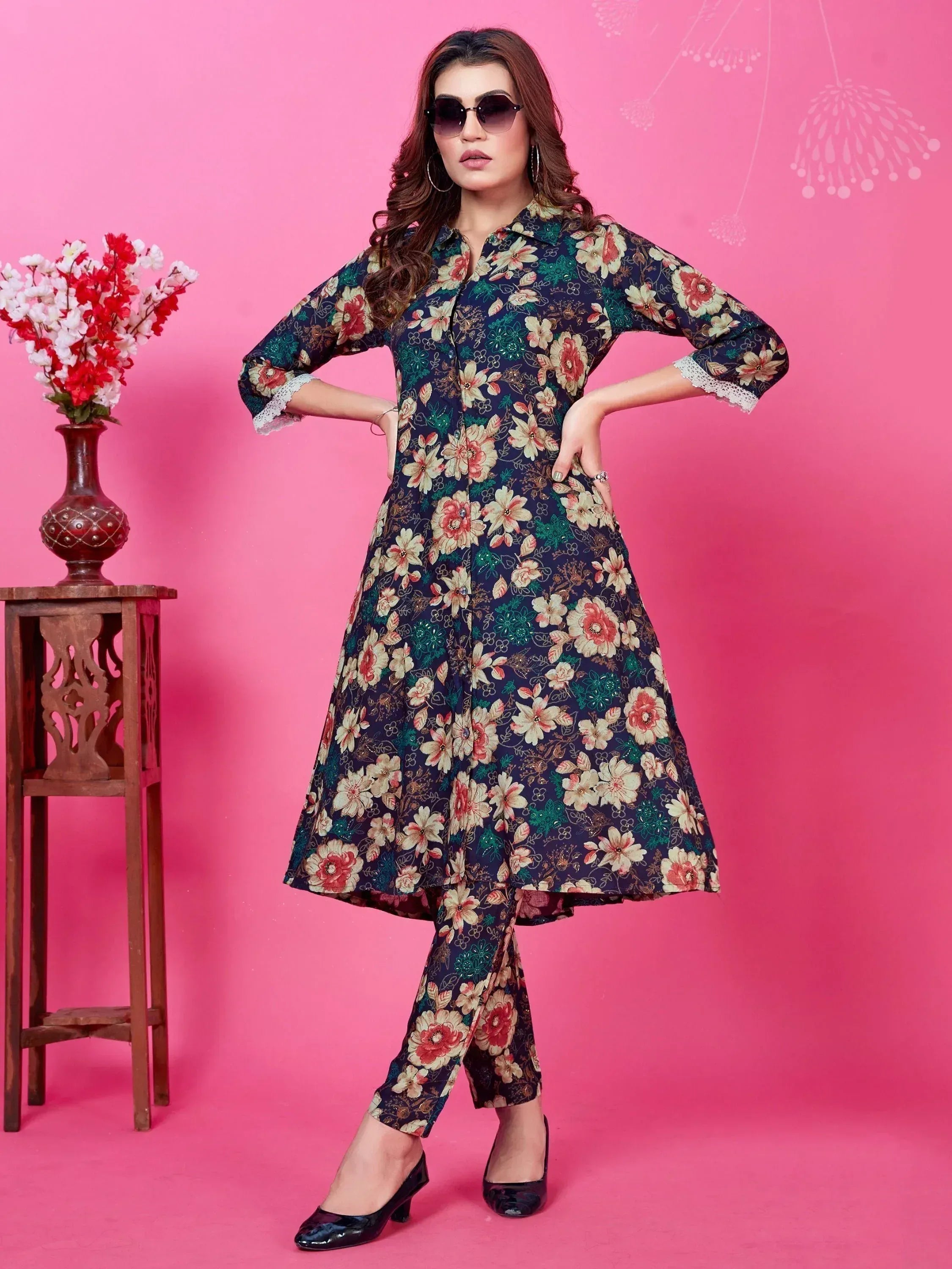 Floral printed ethnic kurta set with lace cuffs, paired with matching pants and black heels