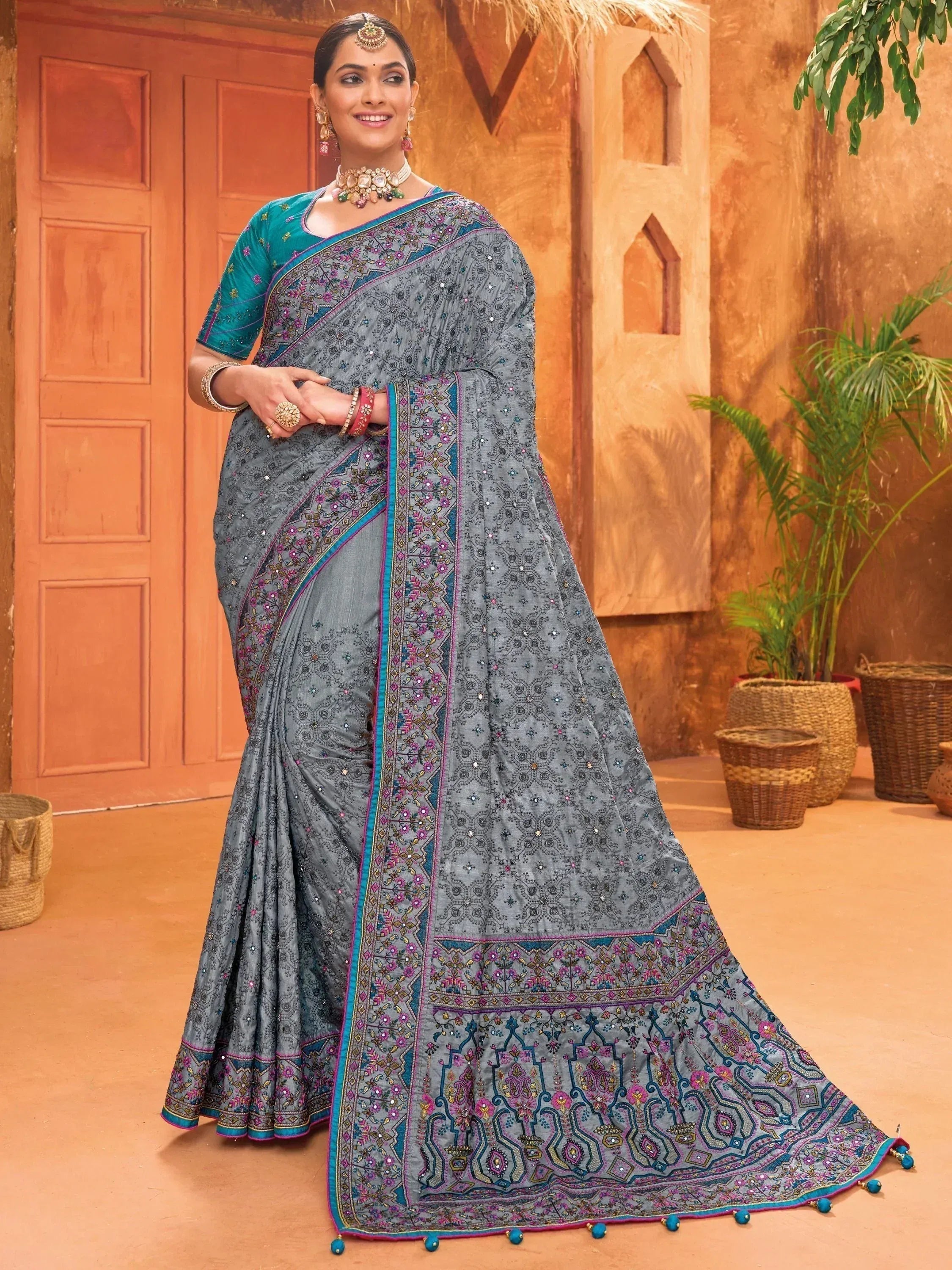 Grey embroidered saree with teal blouse, traditional Indian ethnic wear for women