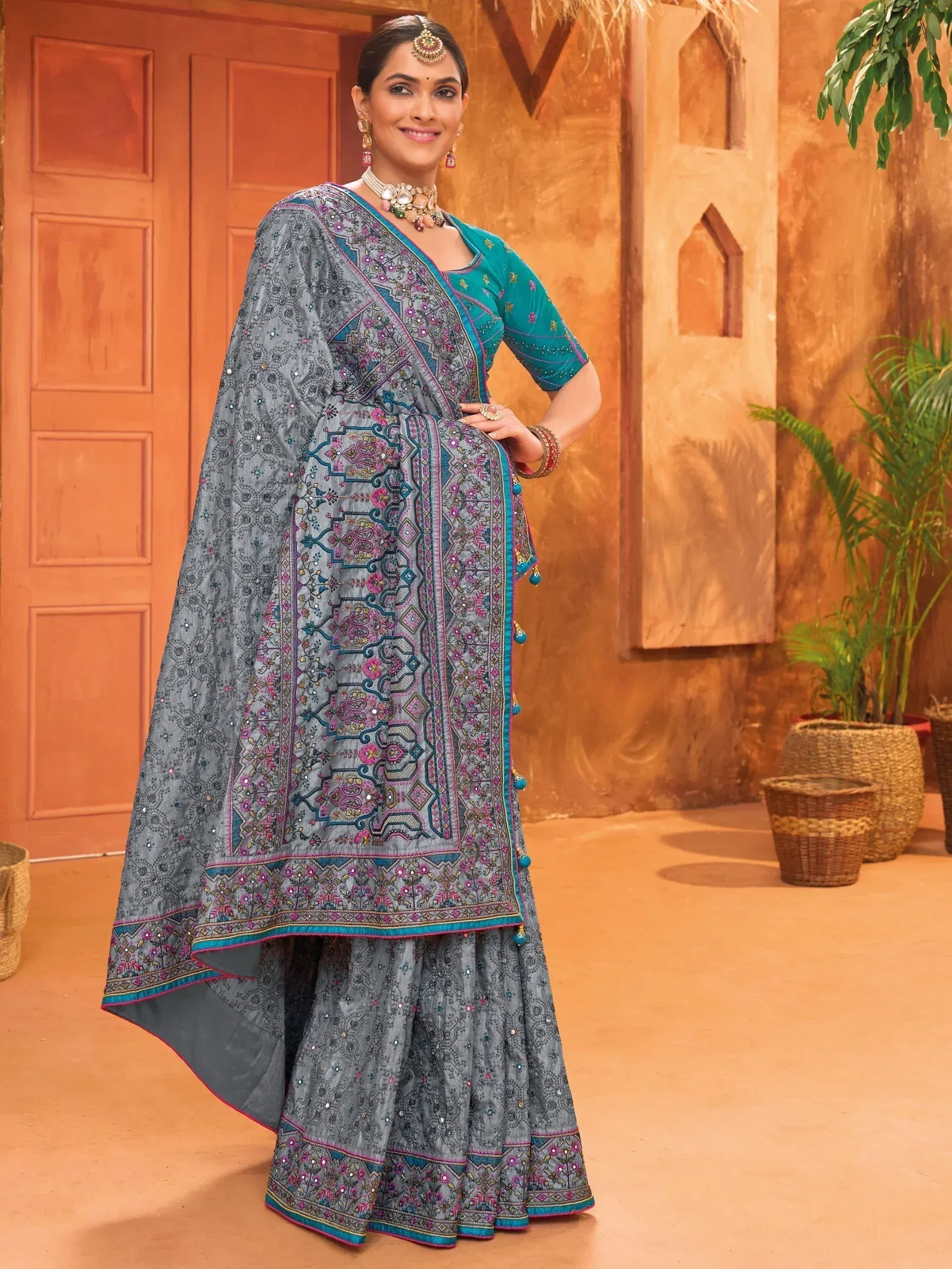 Grey embroidered lehenga choli with teal blouse, perfect for Indian ethnic wear occasions