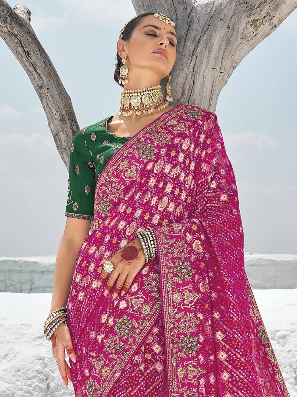 Pink embroidered saree with green blouse, traditional Indian ethnic wear, designer saree with gold detailing
