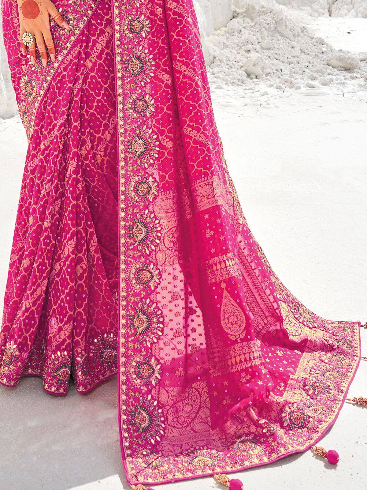 Pink embroidered saree with gold paisley patterns, perfect for Indian ethnic wear occasions