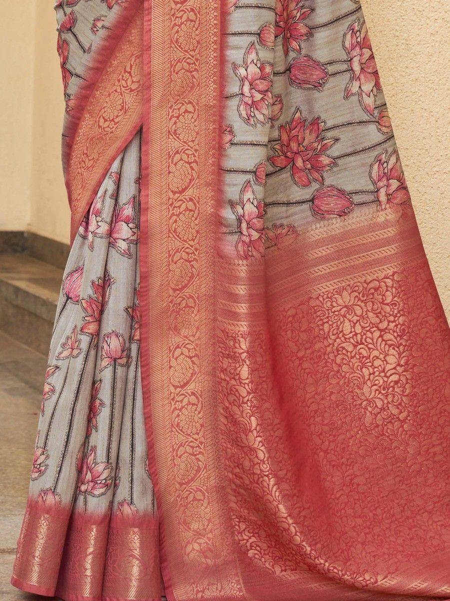 Grey saree with pink floral print and intricate border, elegant ethnic wear for women
