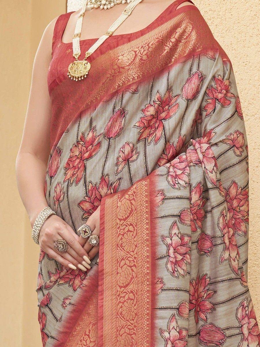 Elegant floral saree with intricate border, perfect for ethnic occasions