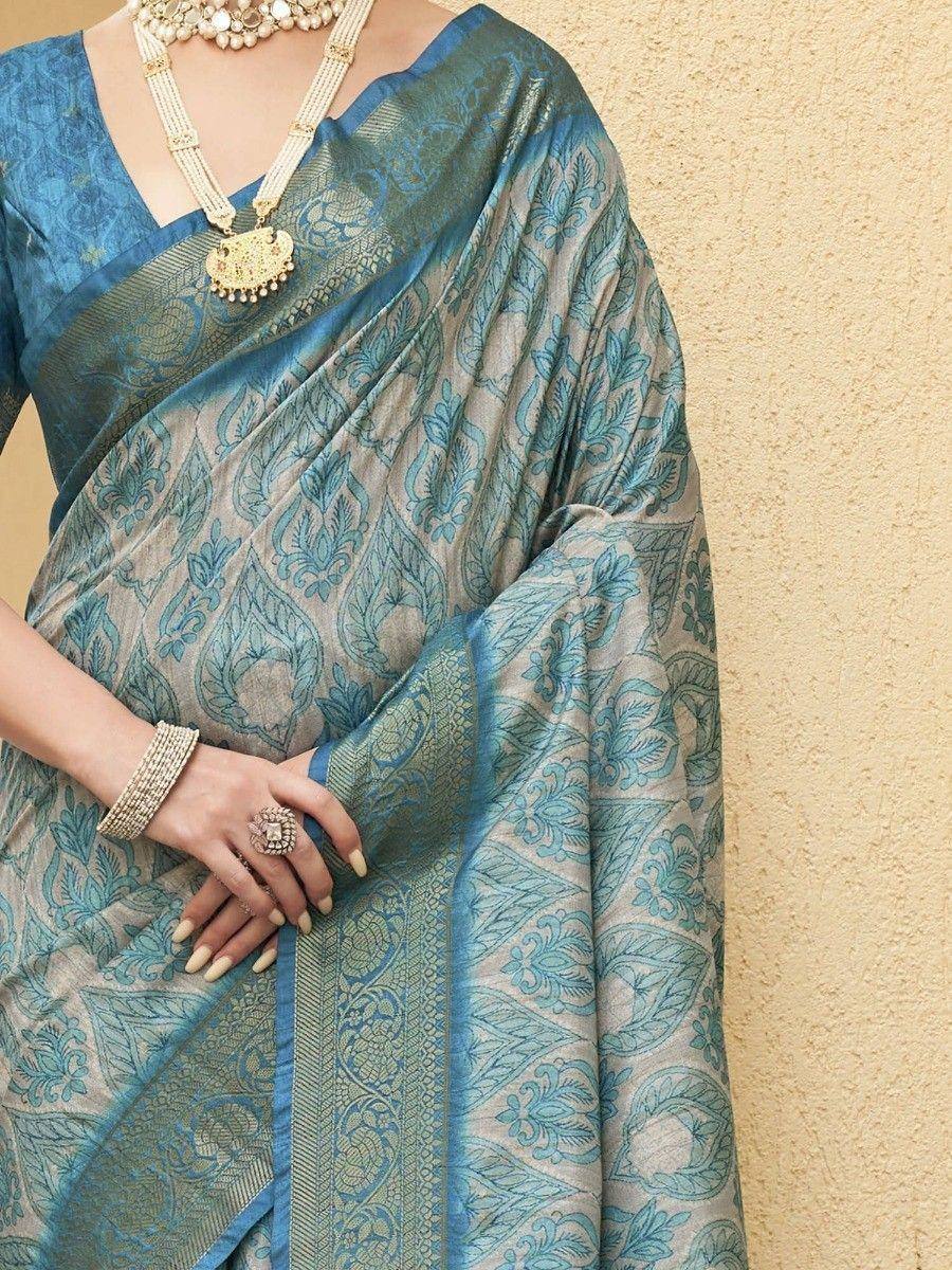 Blue and silver floral print saree with gold jewelry, Indian ethnic wear