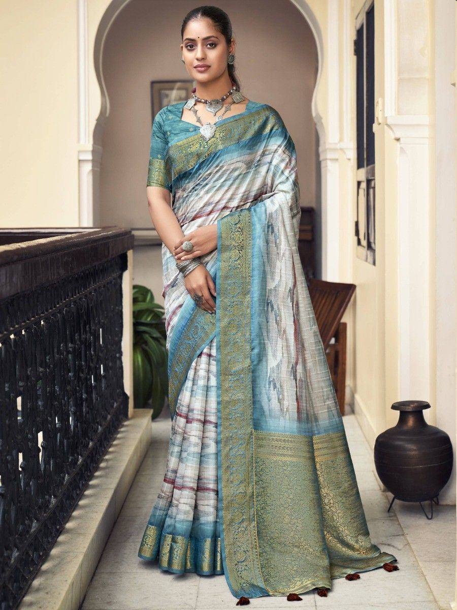 Elegant blue and gold designer saree with intricate border, perfect for Indian ethnic occasions.
