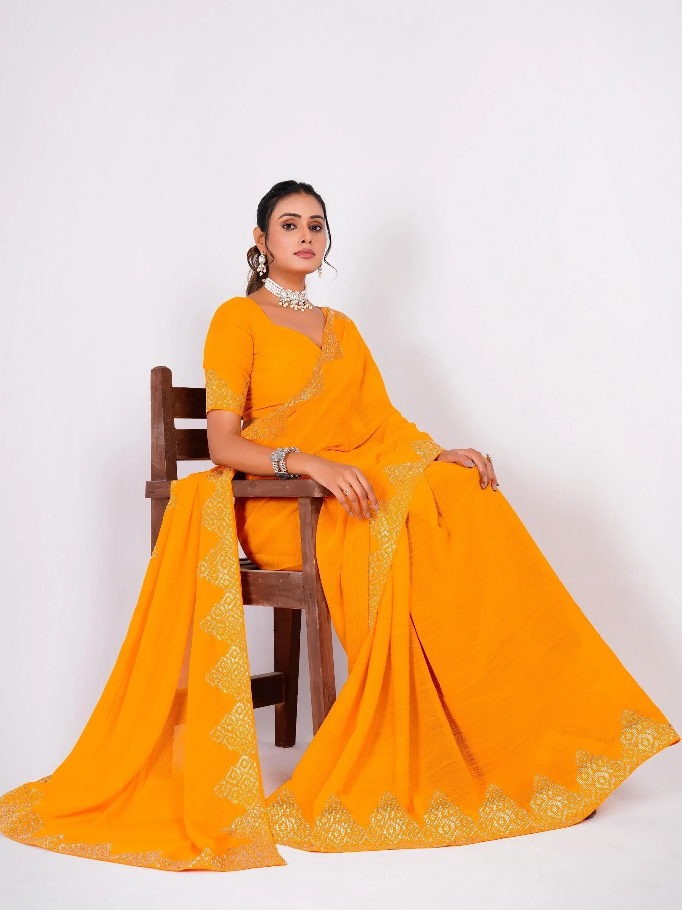Charming Yellow Swarovski Work Georgette Haldi Wear Saree