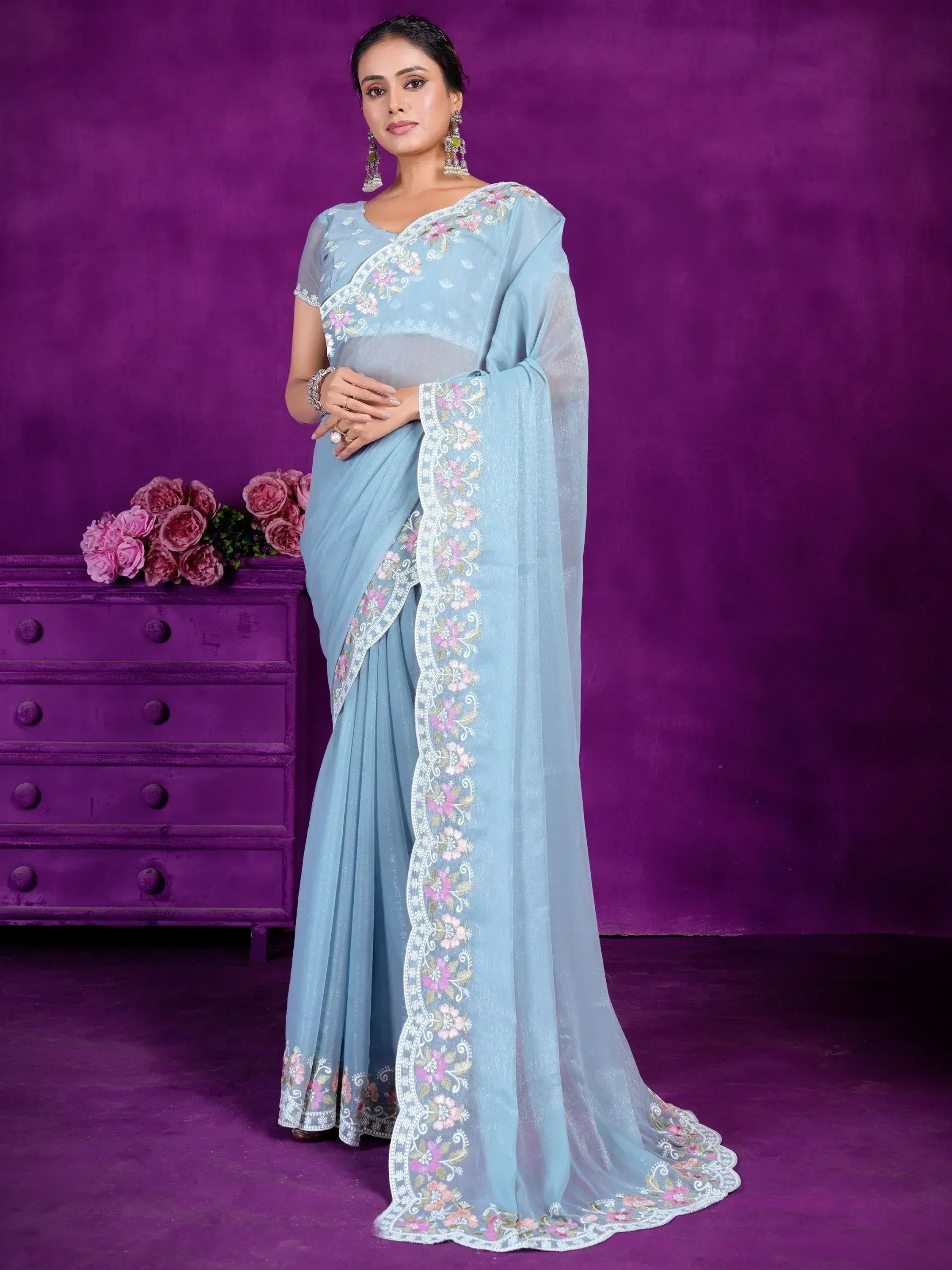 Light blue embroidered saree with floral detailing, perfect for Indian ethnic occasions