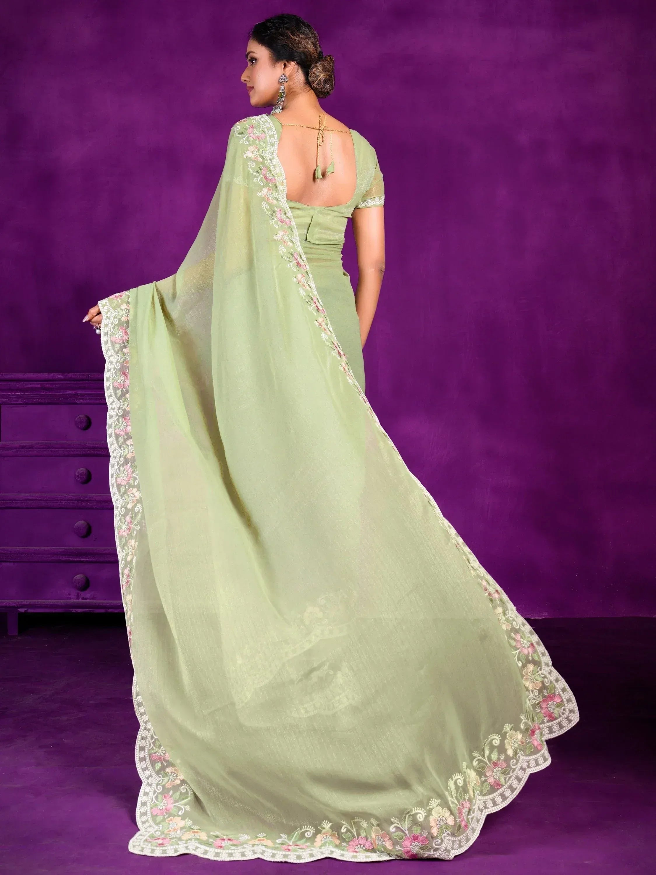 Light green embroidered saree with floral border, back view, ethnic wear for women