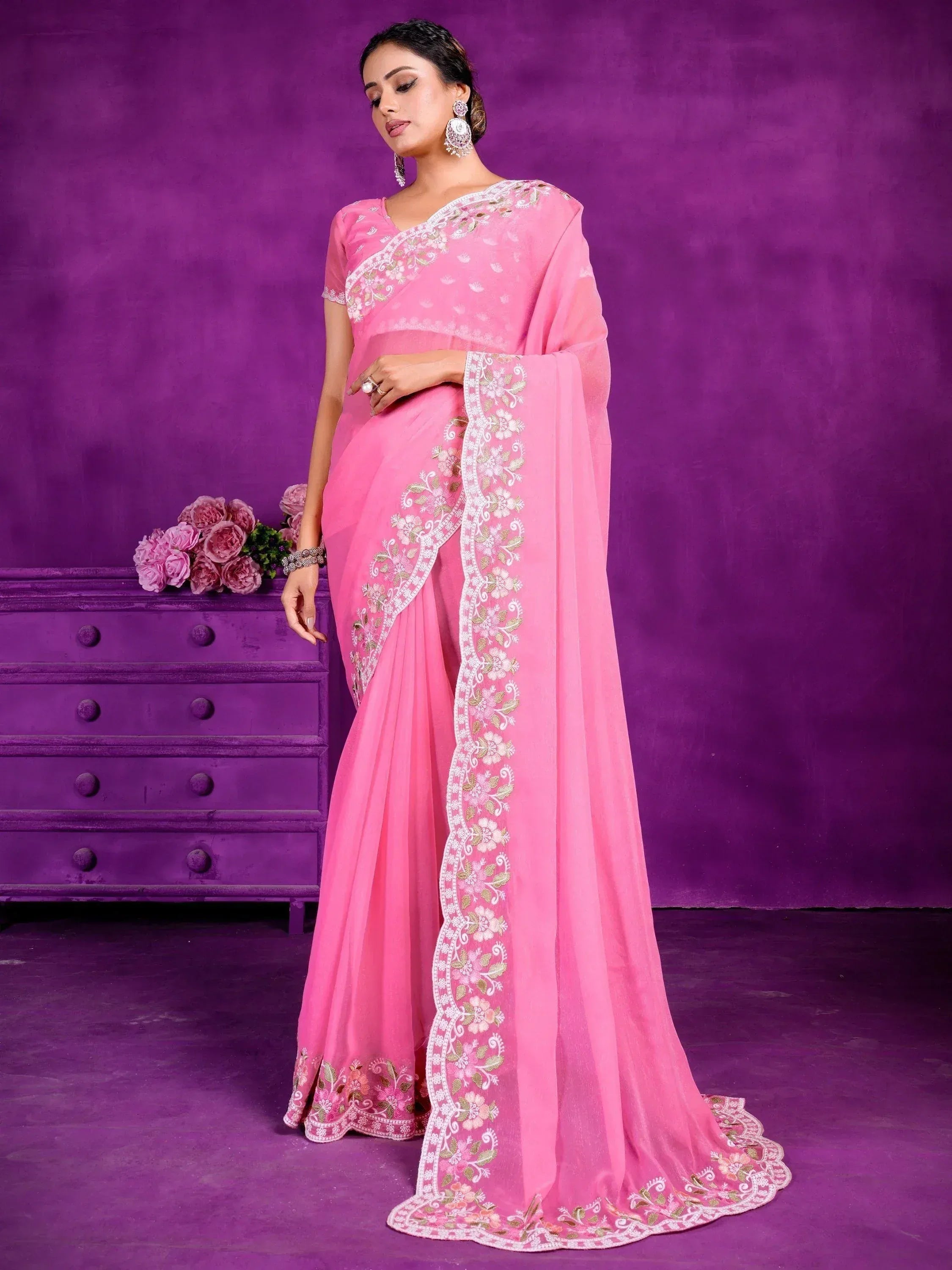 Pink embroidered saree with floral detailing, perfect for Indian ethnic wear occasions