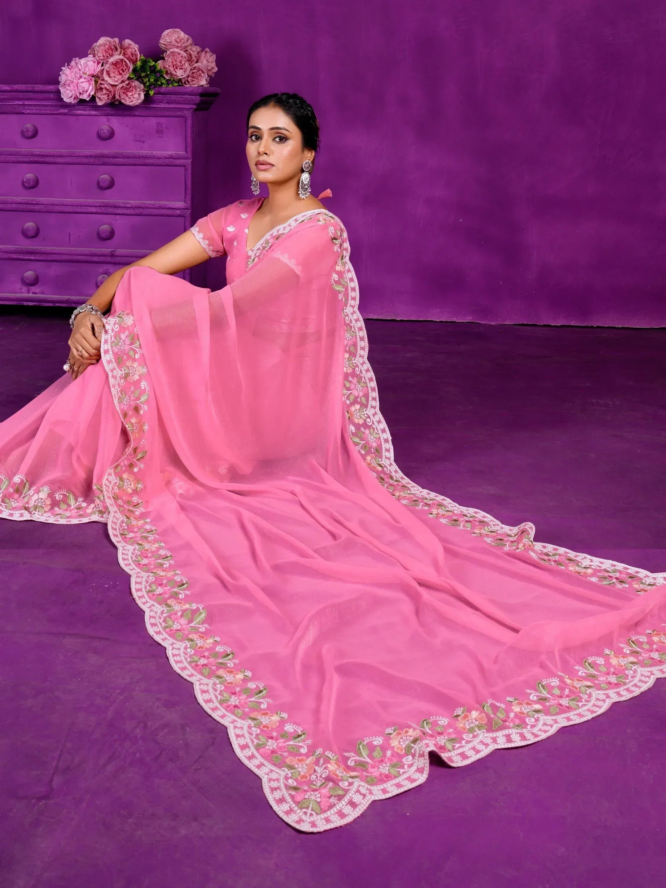 Pink embroidered ethnic gown with floral lace, perfect for Indian occasions and festive wear.