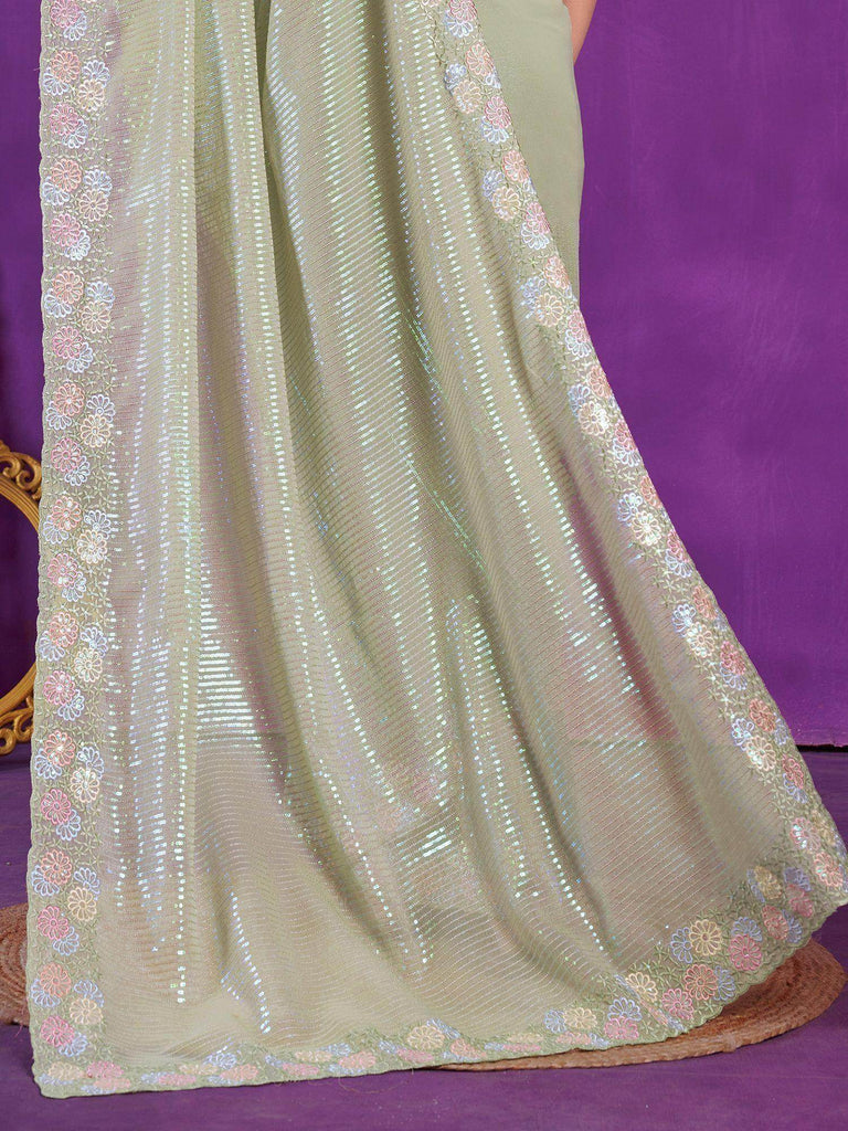 Fascinating Pista Green Sequins Organza Reception Wear Saree