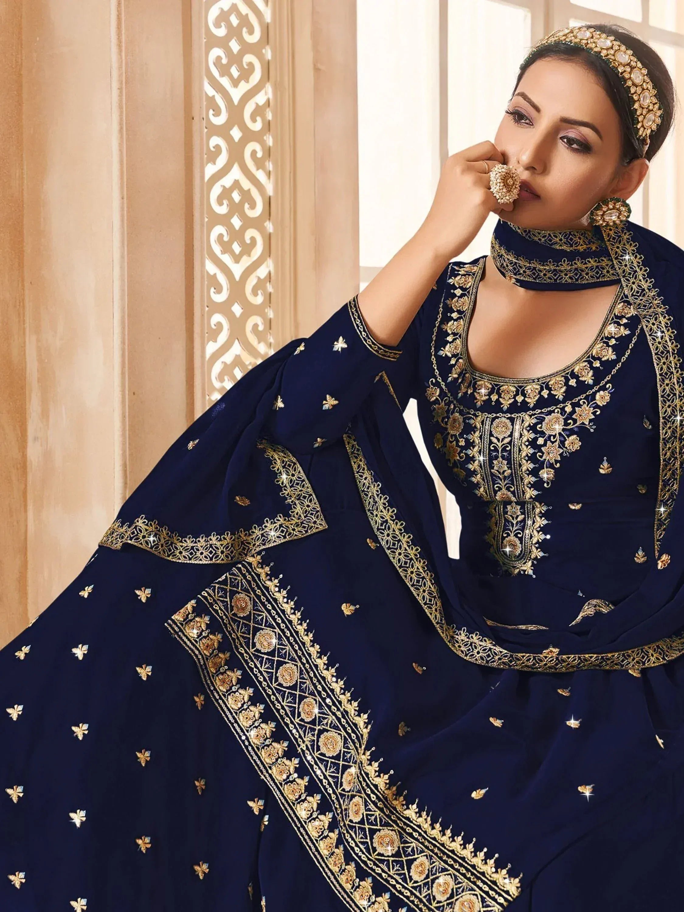 Navy blue designer salwar kameez with gold embroidery and matching dupatta, perfect for Indian ethnic wear occasions