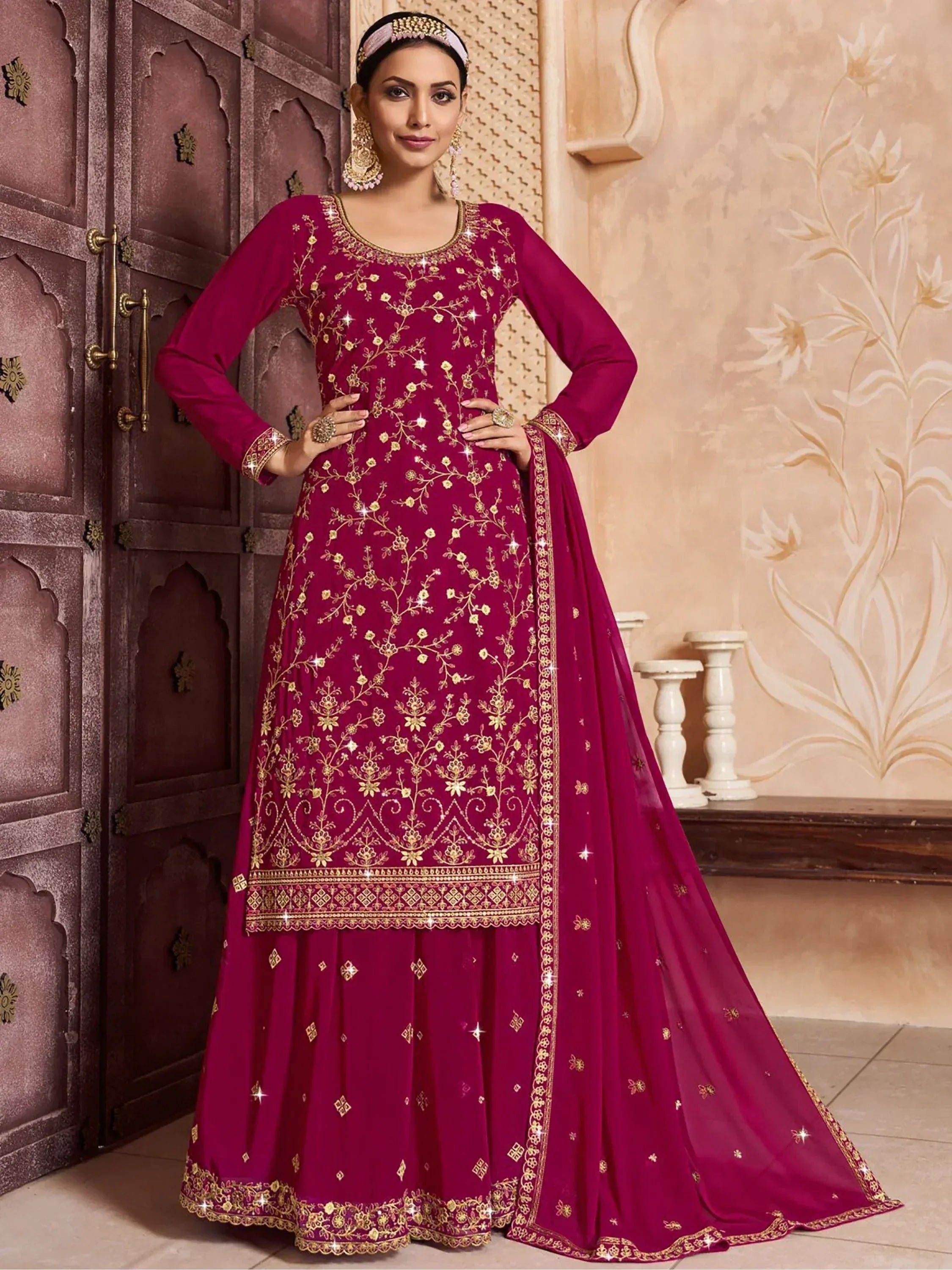 Magenta designer salwar kameez with gold embroidery, perfect for Indian ethnic wear and festive occasions.