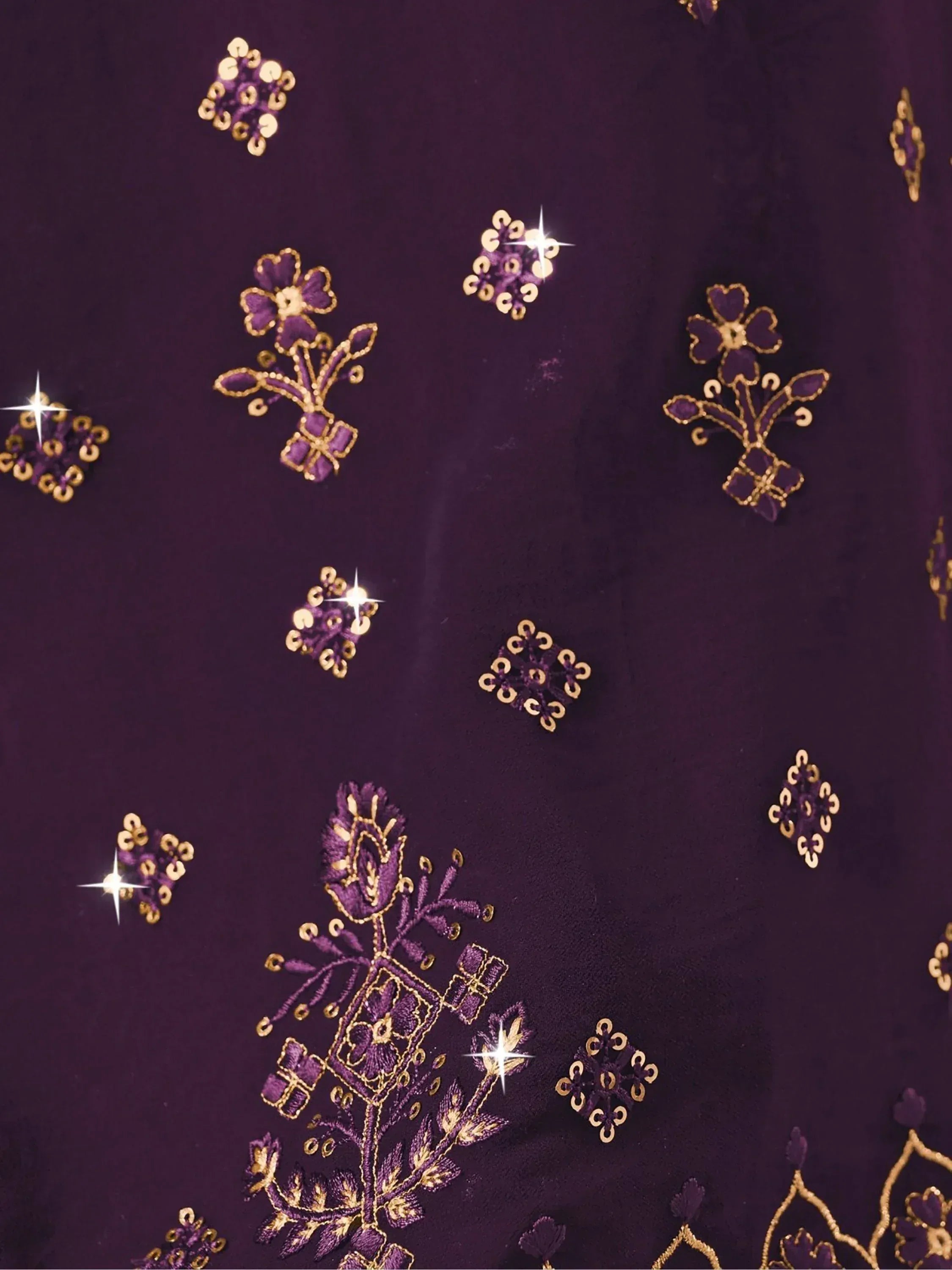 Purple ethnic wear with gold floral embroidery and sequin details