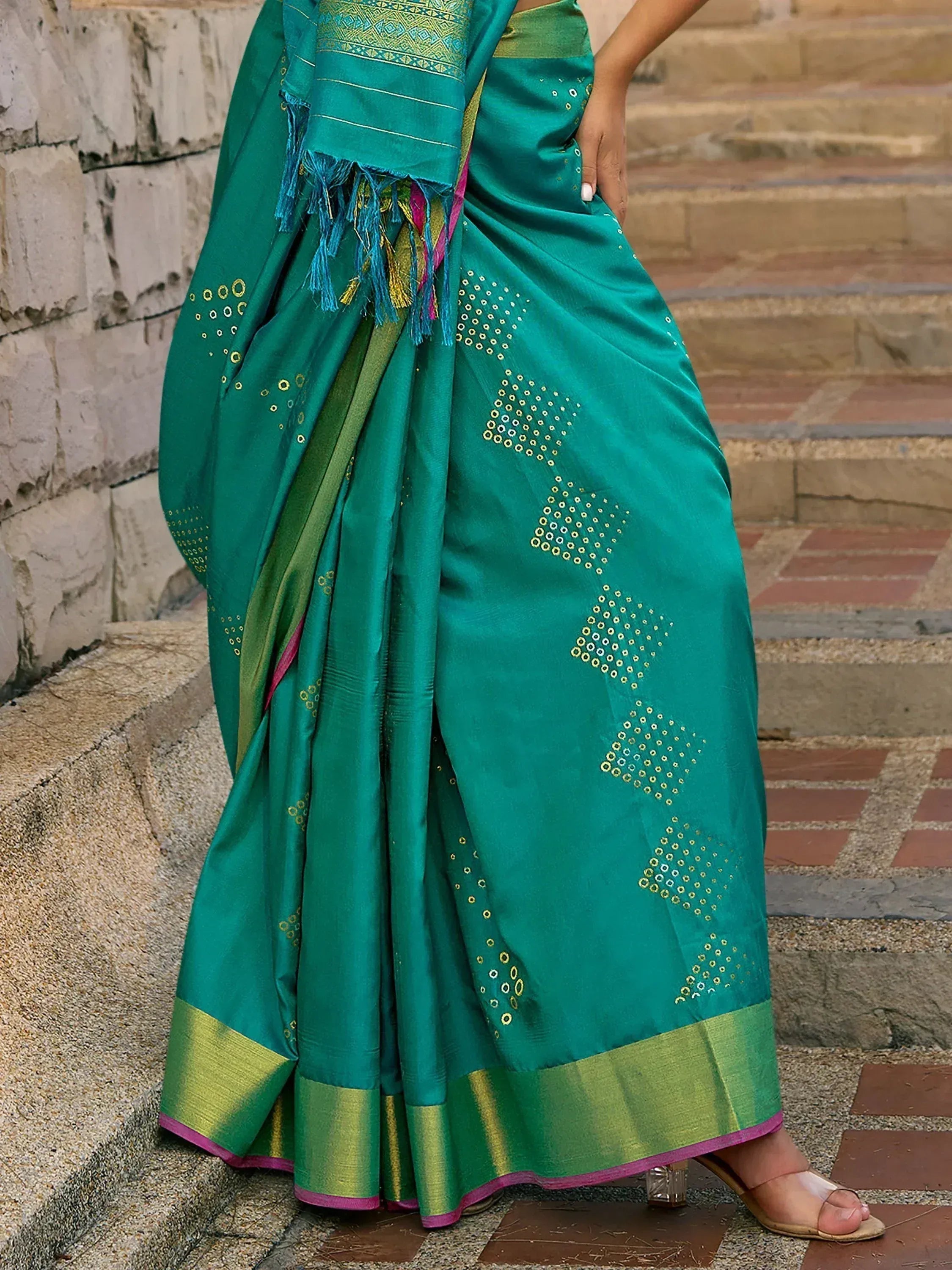 Teal green saree with gold mirror work and zari border, styled with matching blouse and dupatta