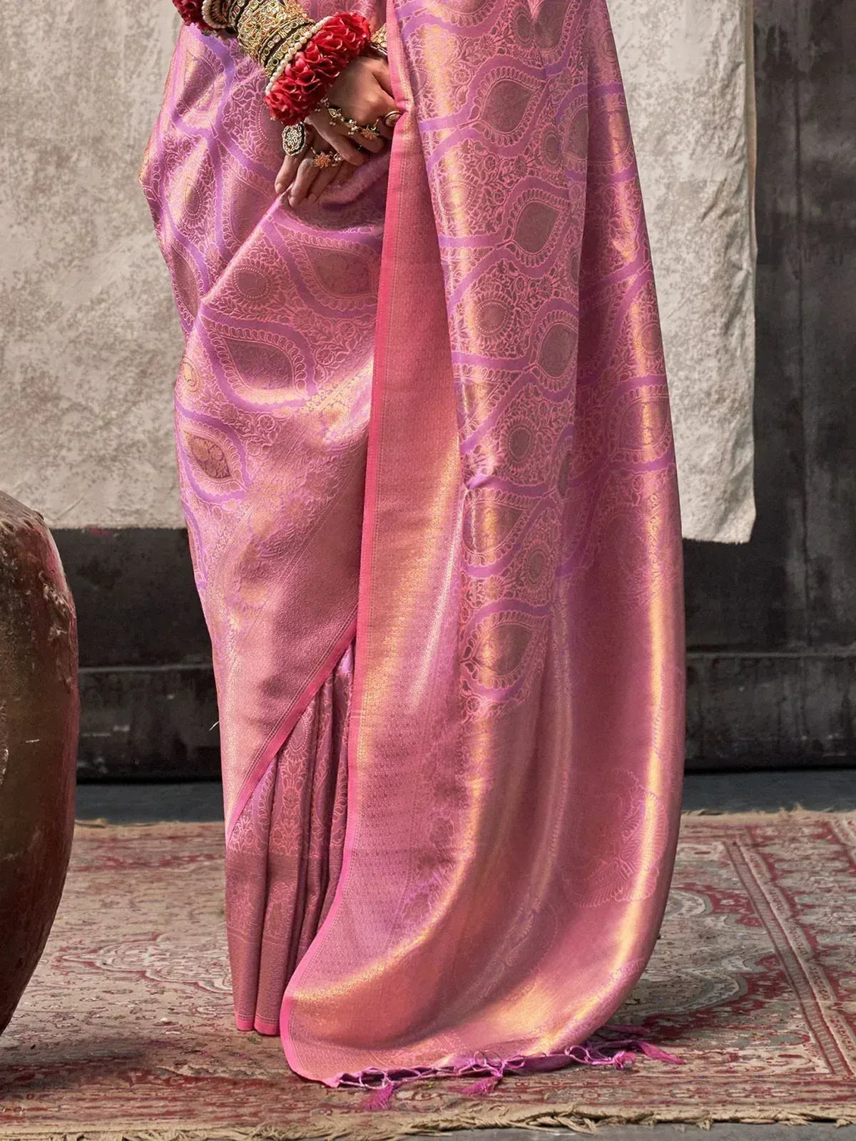Pink designer saree with intricate paisley weave, perfect for Indian ethnic wear occasions