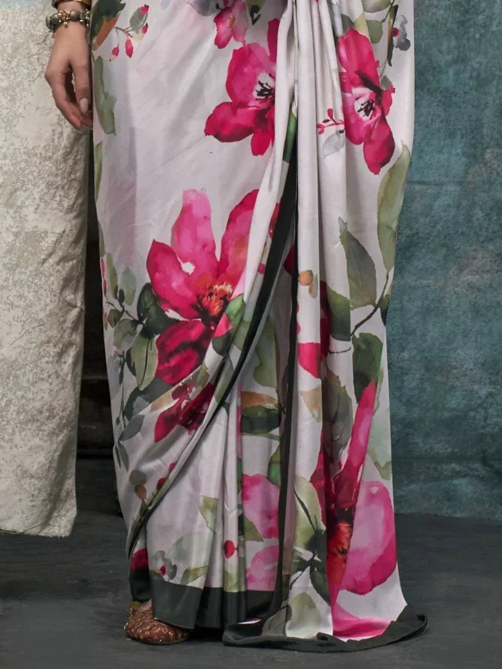 Floral print saree with pink blossoms and green leaves, elegant ethnic wear for women