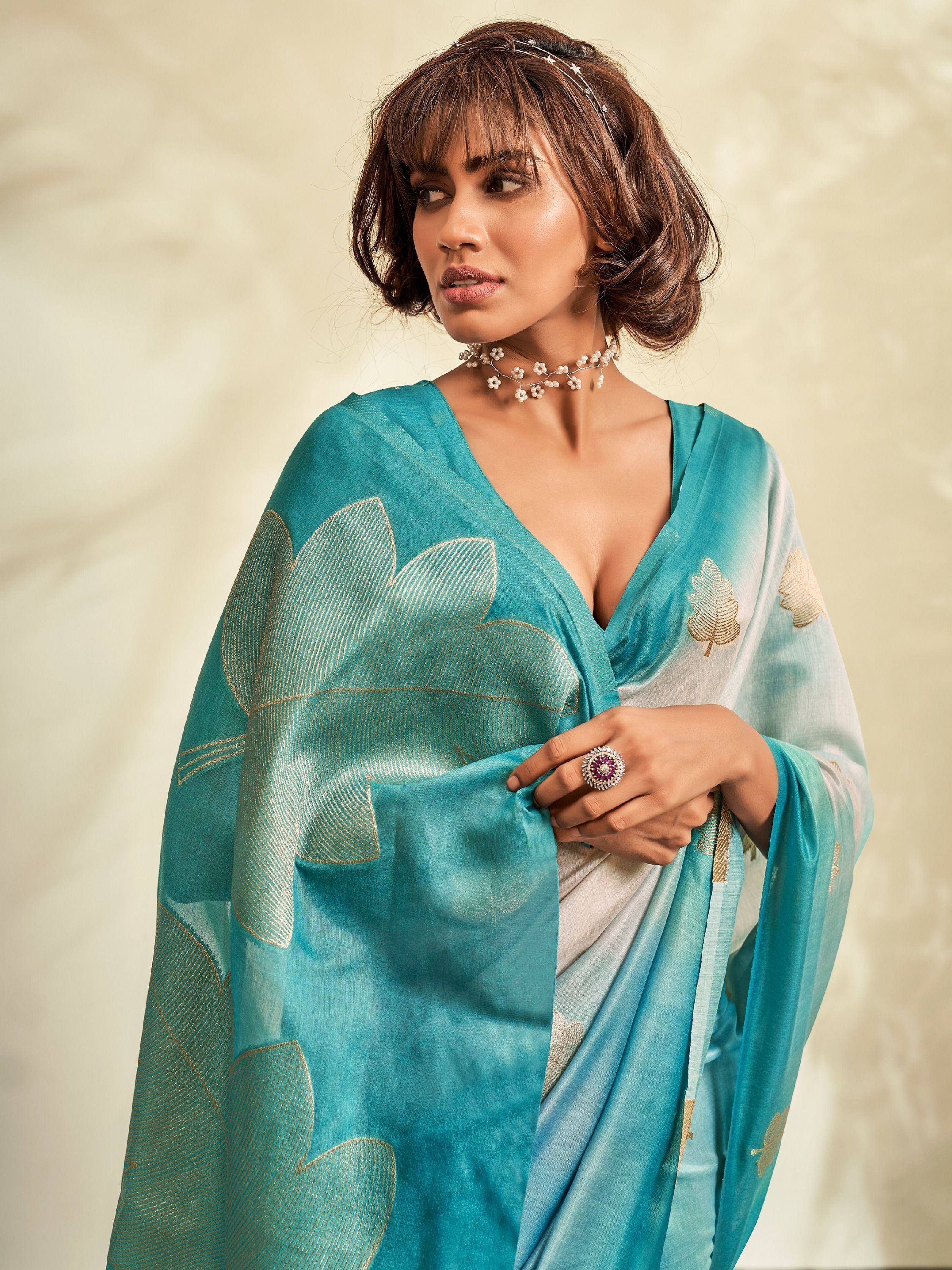 Teal saree with gold leaf print, elegant Indian ethnic wear for women