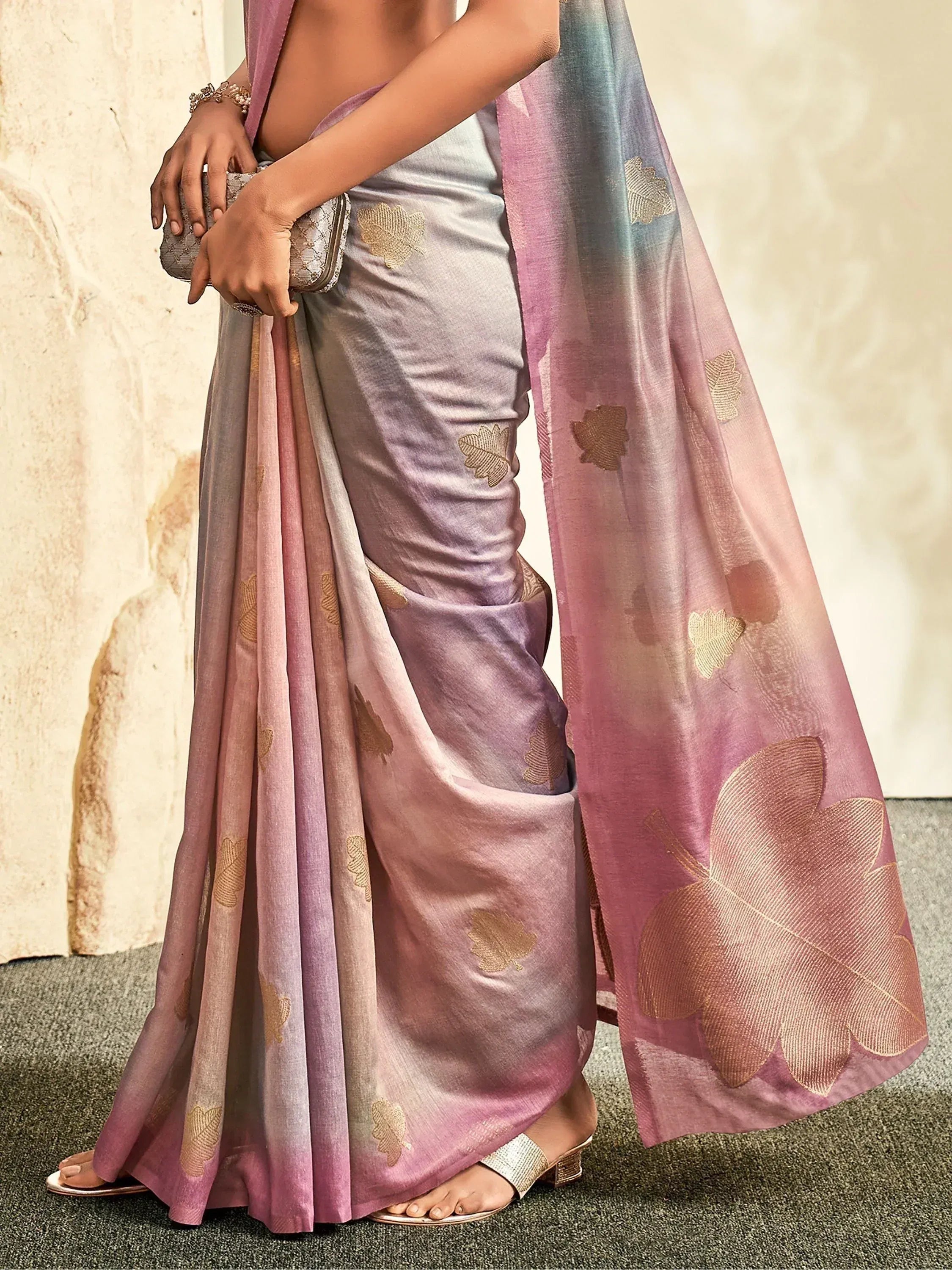 Elegant pastel saree with gold leaf embroidery, perfect for Indian ethnic wear occasions