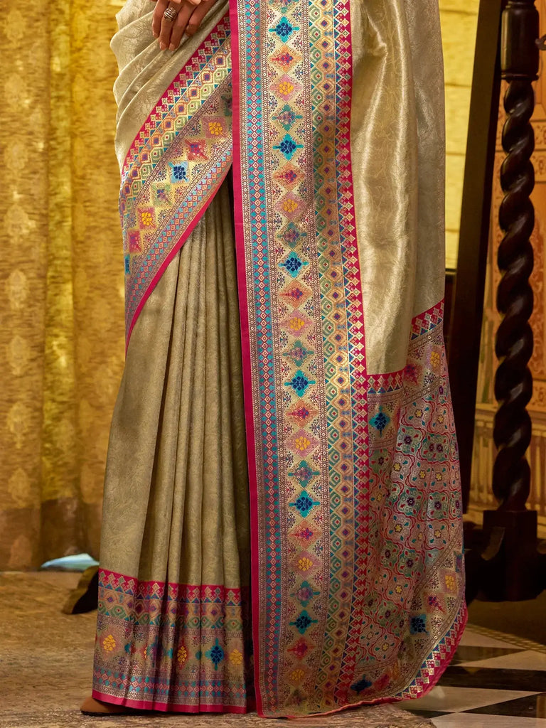 Fascinating Beige Zari Weaving Tissue Silk Traditional Saree With Blouse