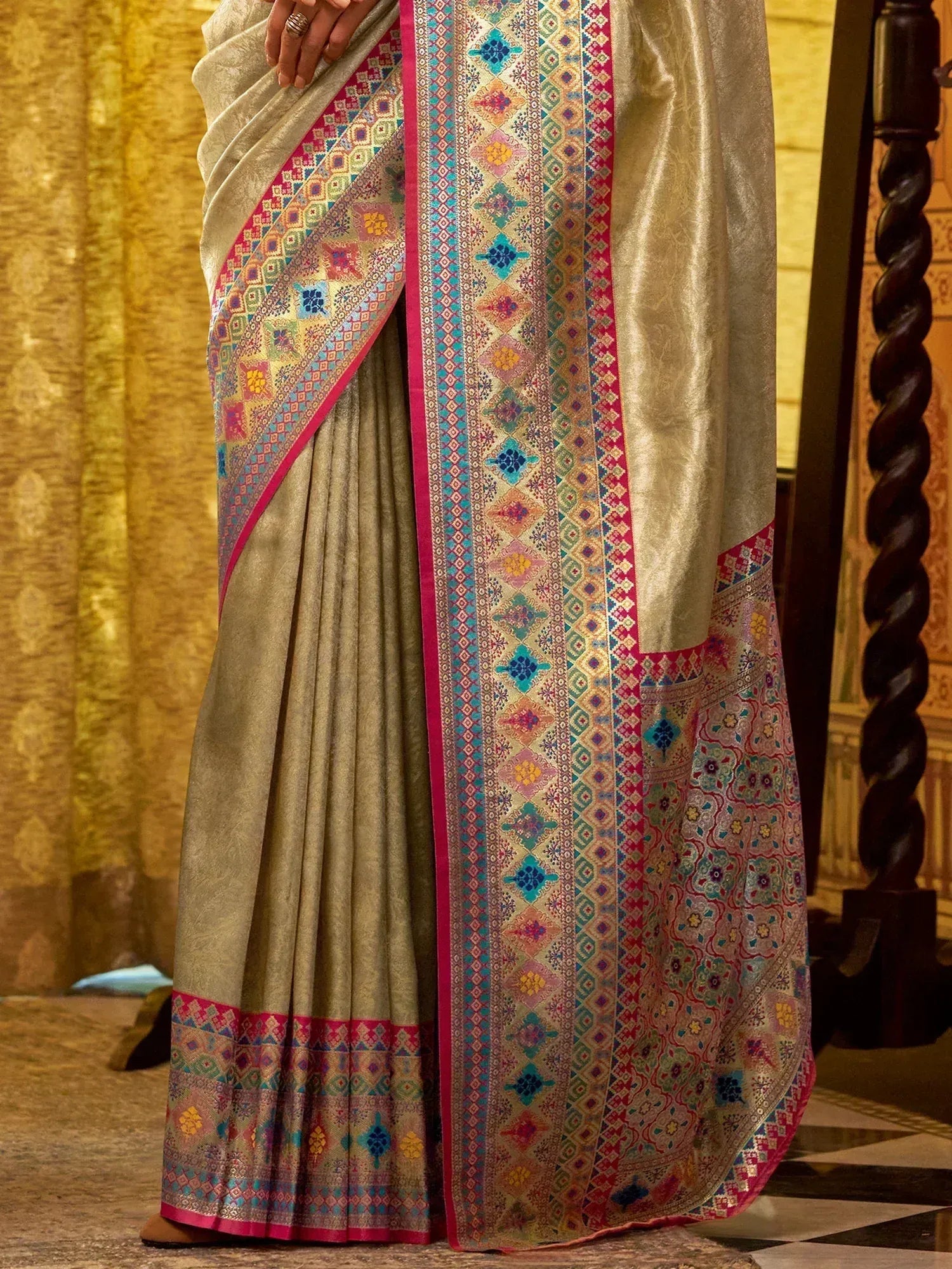 Elegant beige saree with colorful geometric border, perfect for Indian ethnic wear