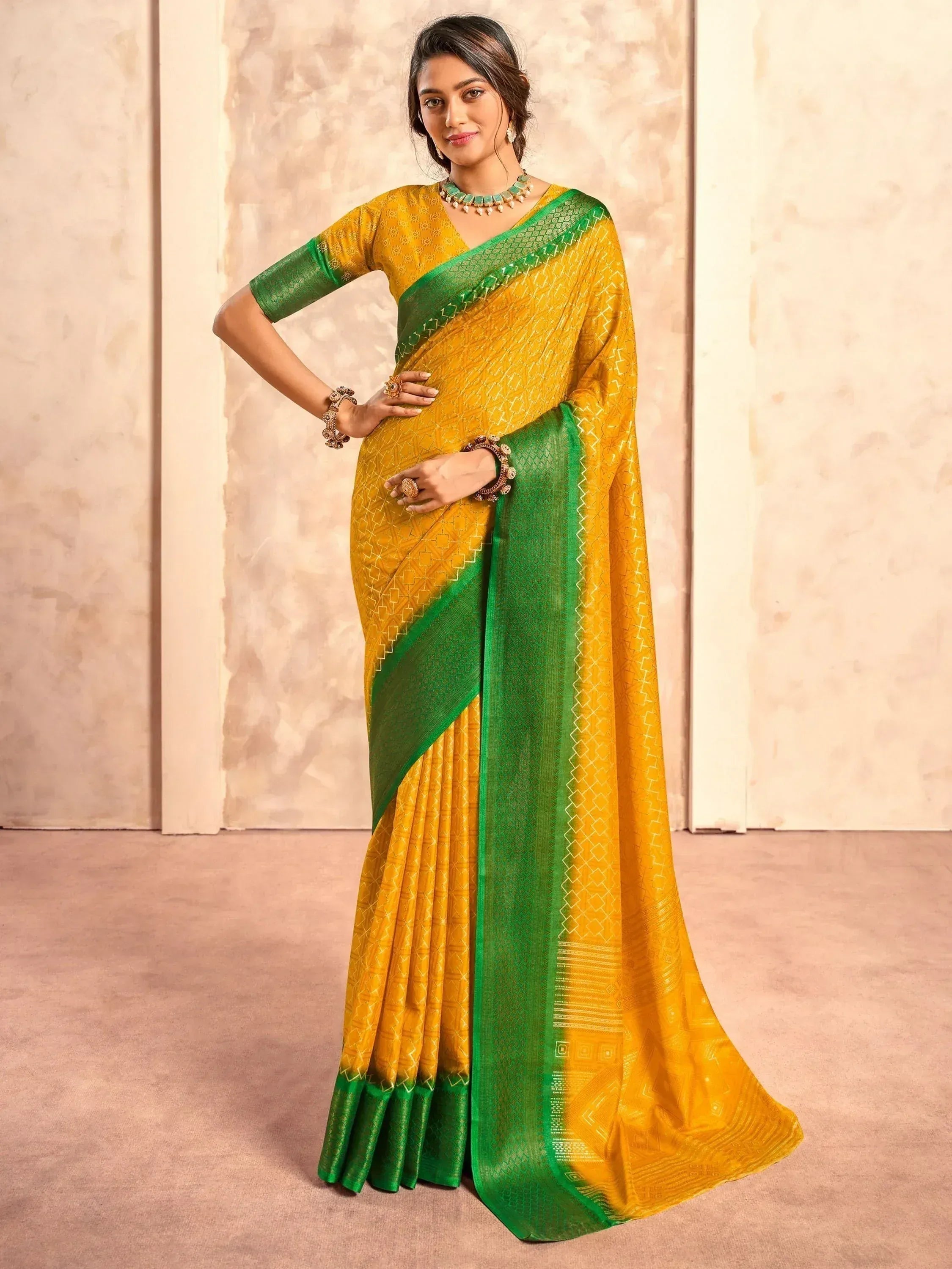 Yellow and green designer saree with geometric print, perfect for ethnic occasions