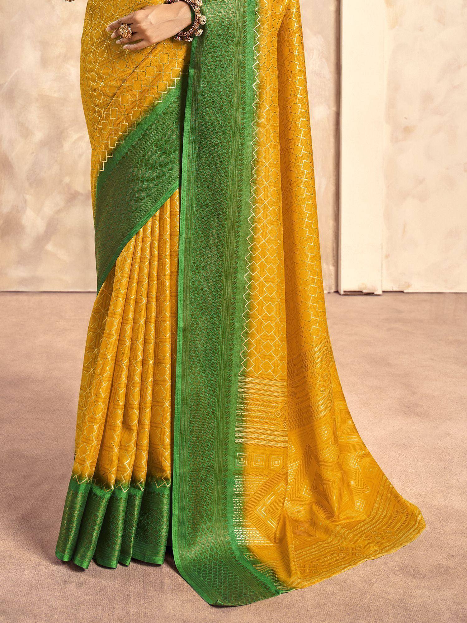 Yellow and green ethnic saree with geometric print and woven border, perfect for traditional occasions
