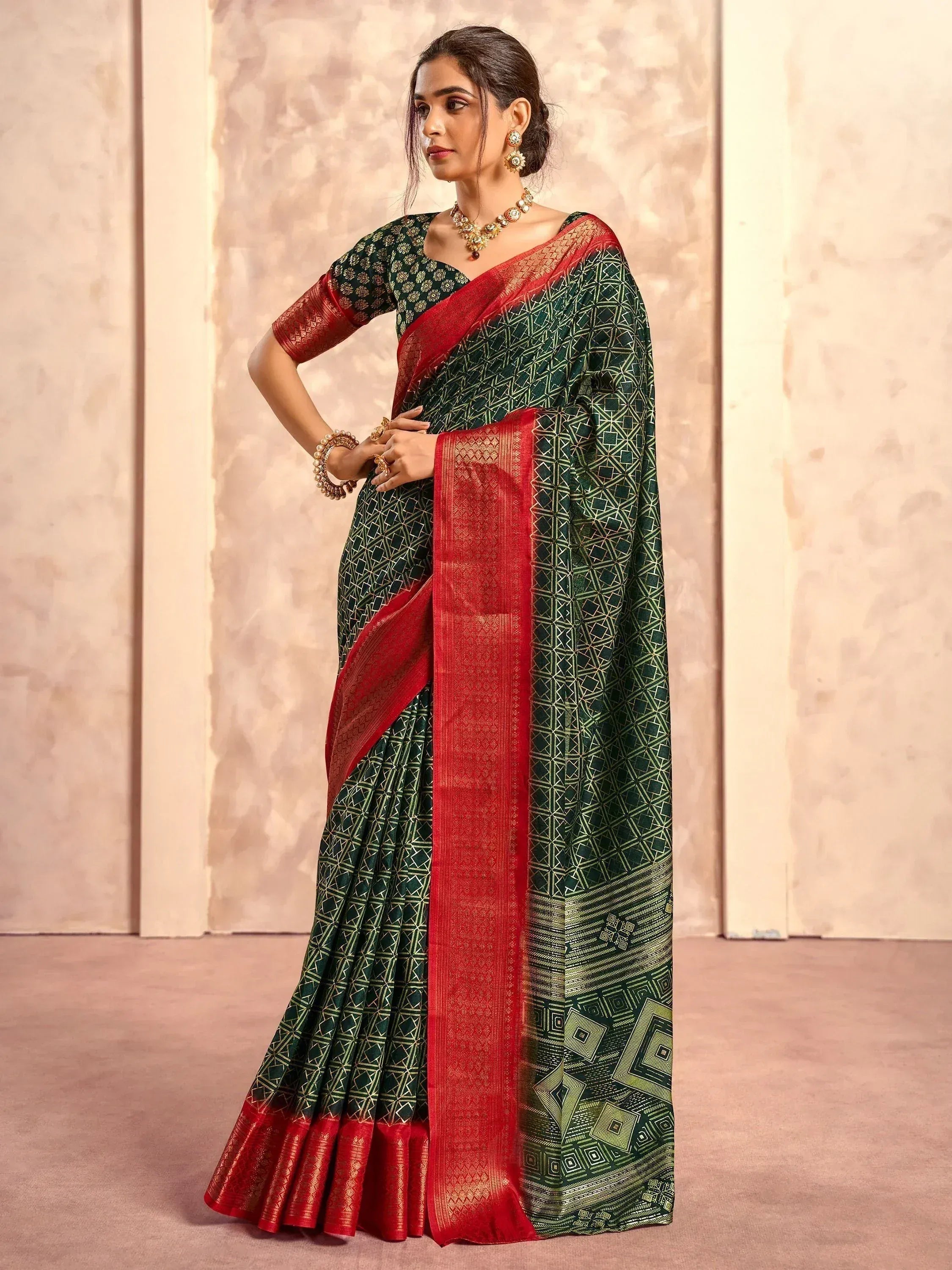Green and red geometric print saree with gold detailing, perfect for Indian ethnic wear occasions.