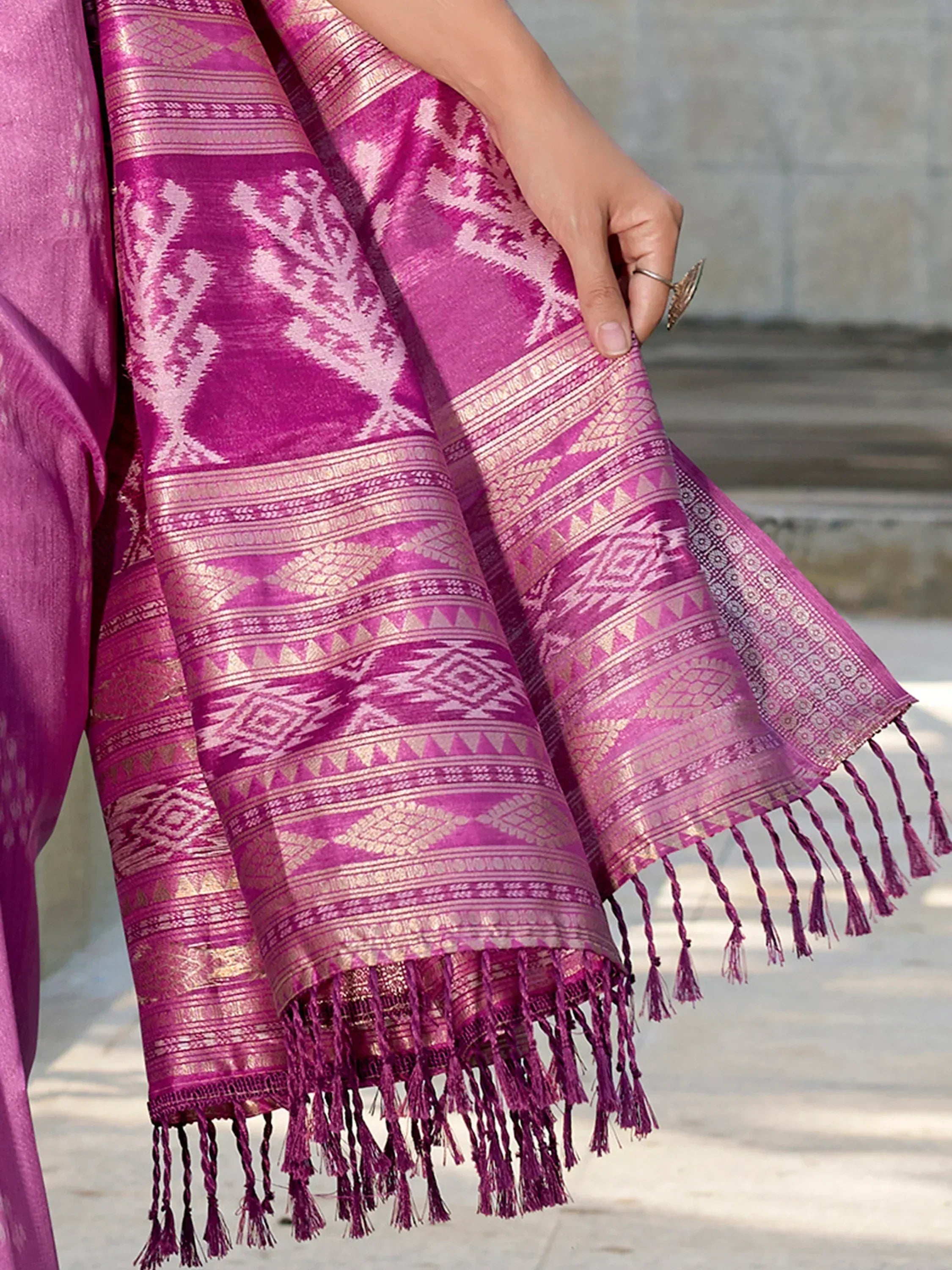 Vibrant pink ethnic dupatta with gold geometric patterns and tassels, perfect for Indian wear