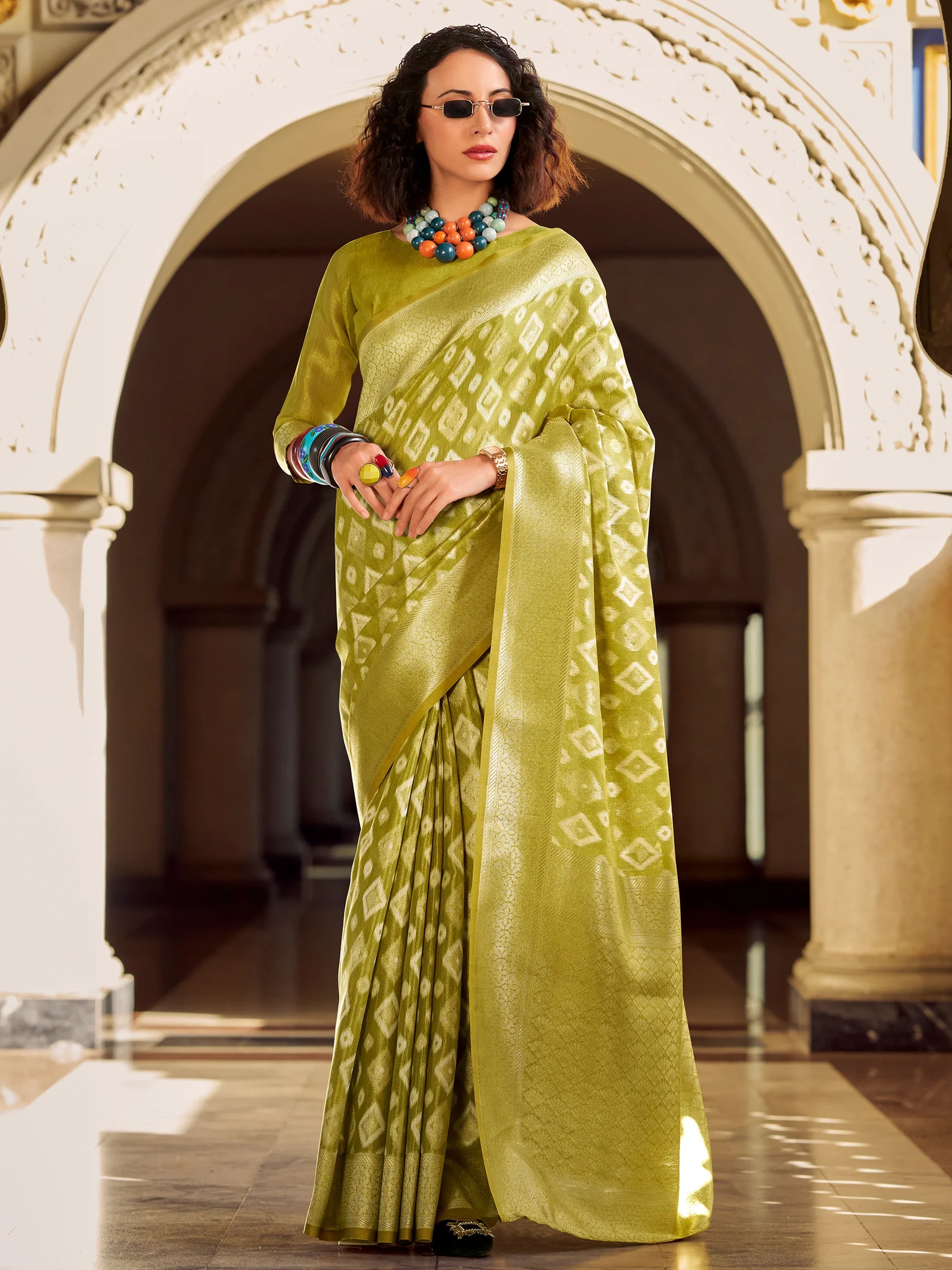 Captivating Olive Green Zari Weaving Silk Festival Wear Saree