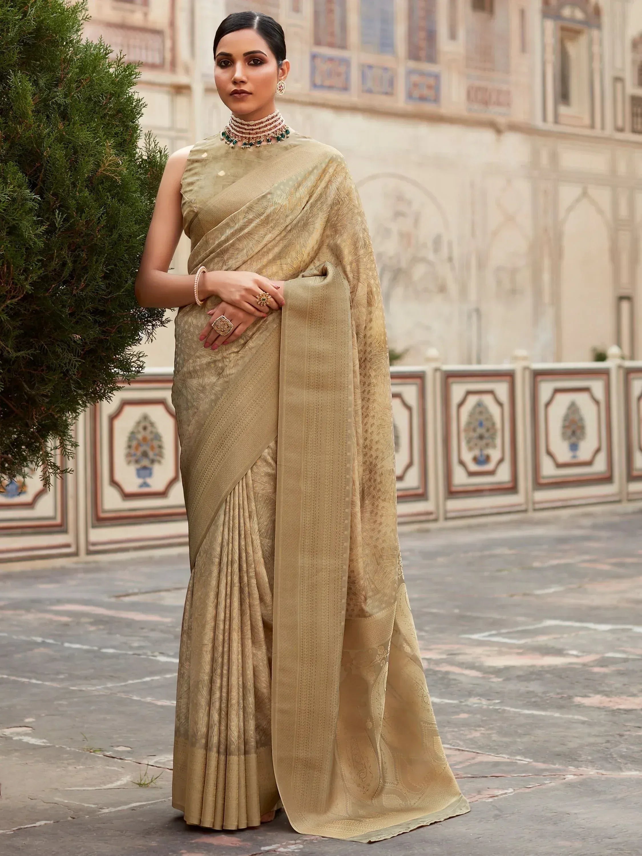 Elegant gold designer saree with intricate patterns, perfect for Indian ethnic wear occasions