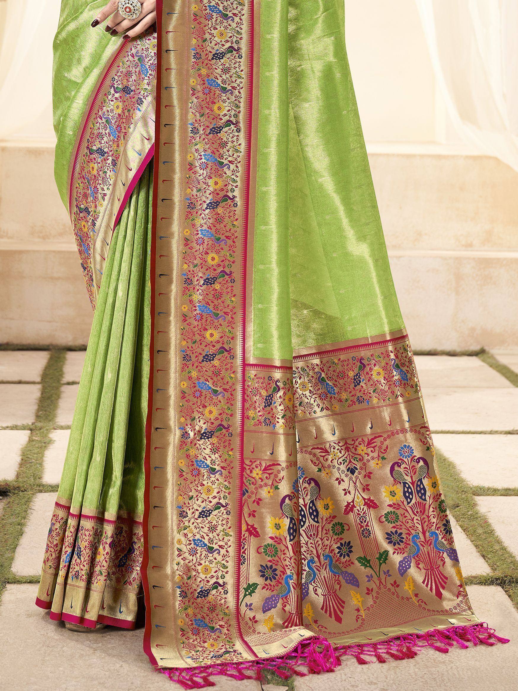 Lime green saree with peacock and floral embroidery, gold border, pink tassels, ethnic Indian wear