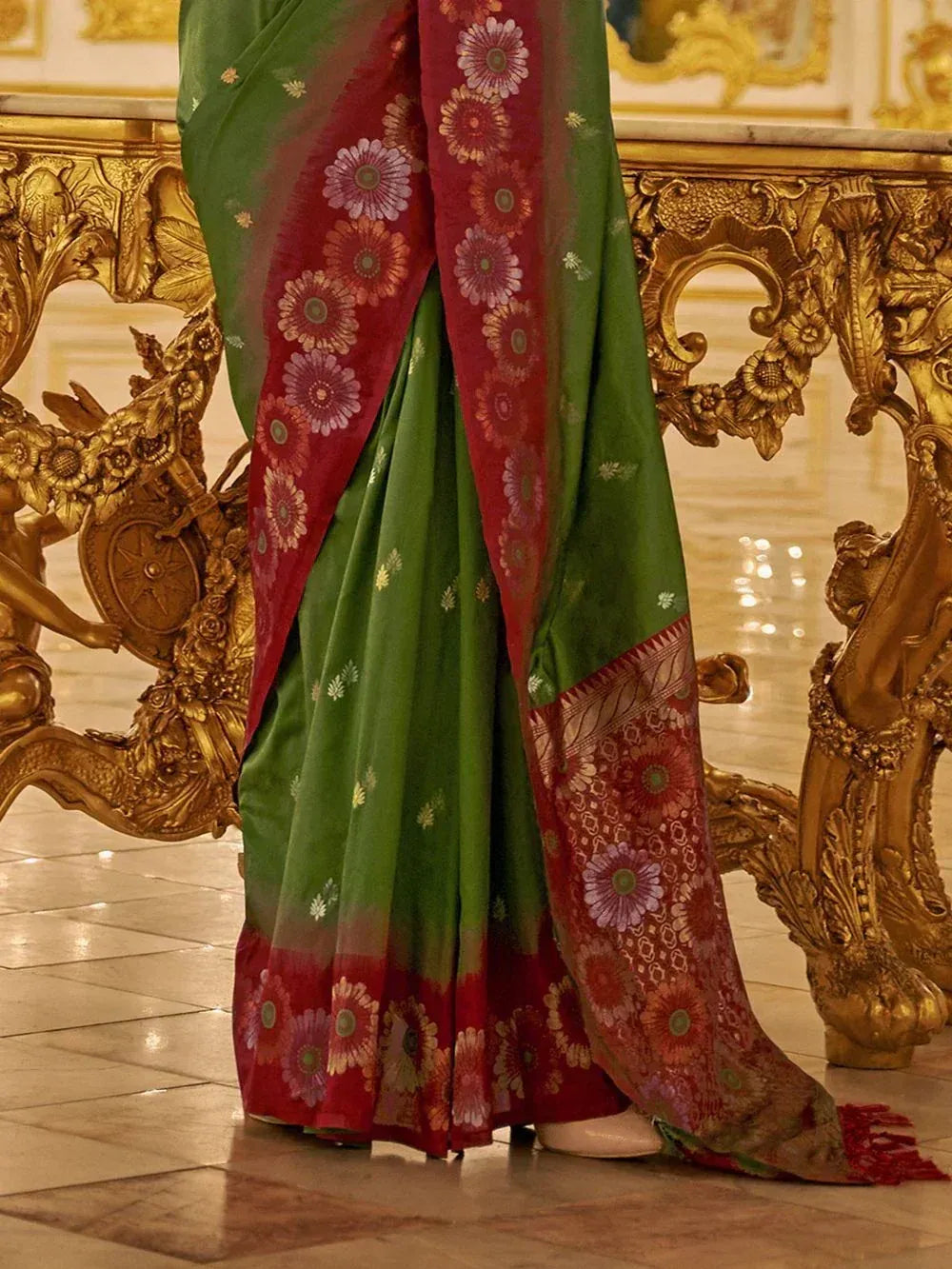 Green and red floral saree with gold accents, elegant Indian ethnic wear for women